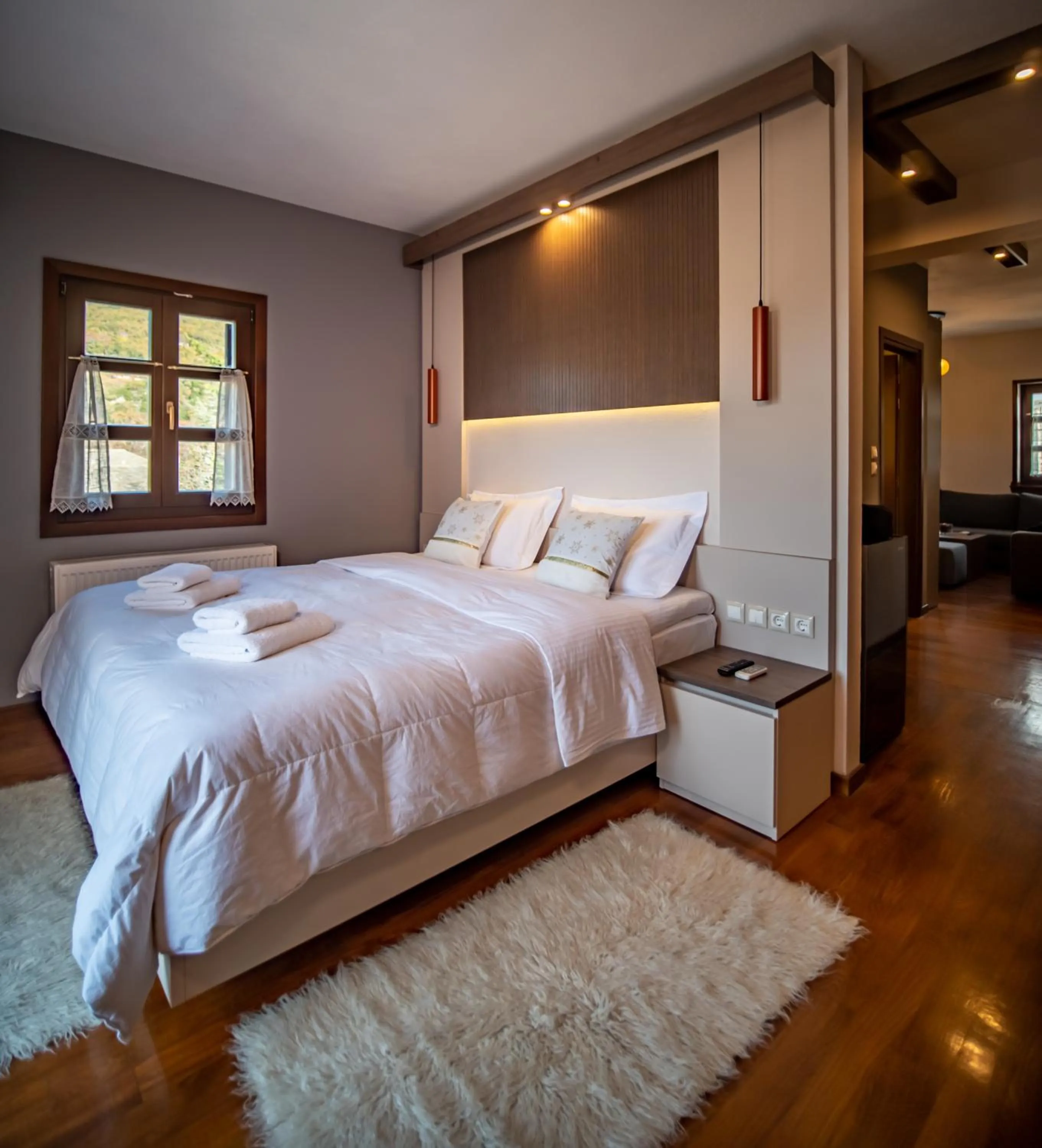 Bed in Erofili Hotel & Suites