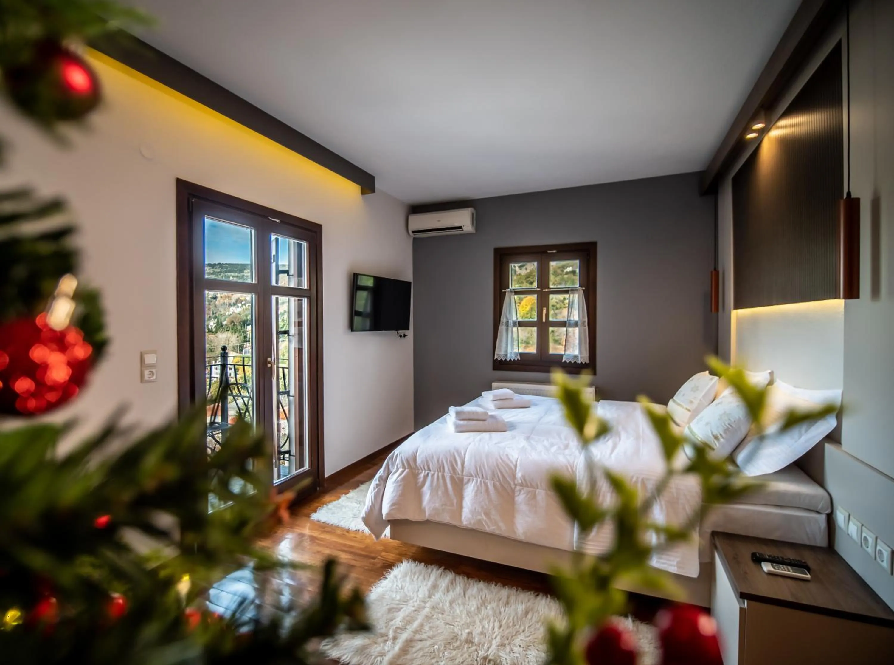 Bed in Erofili Hotel & Suites