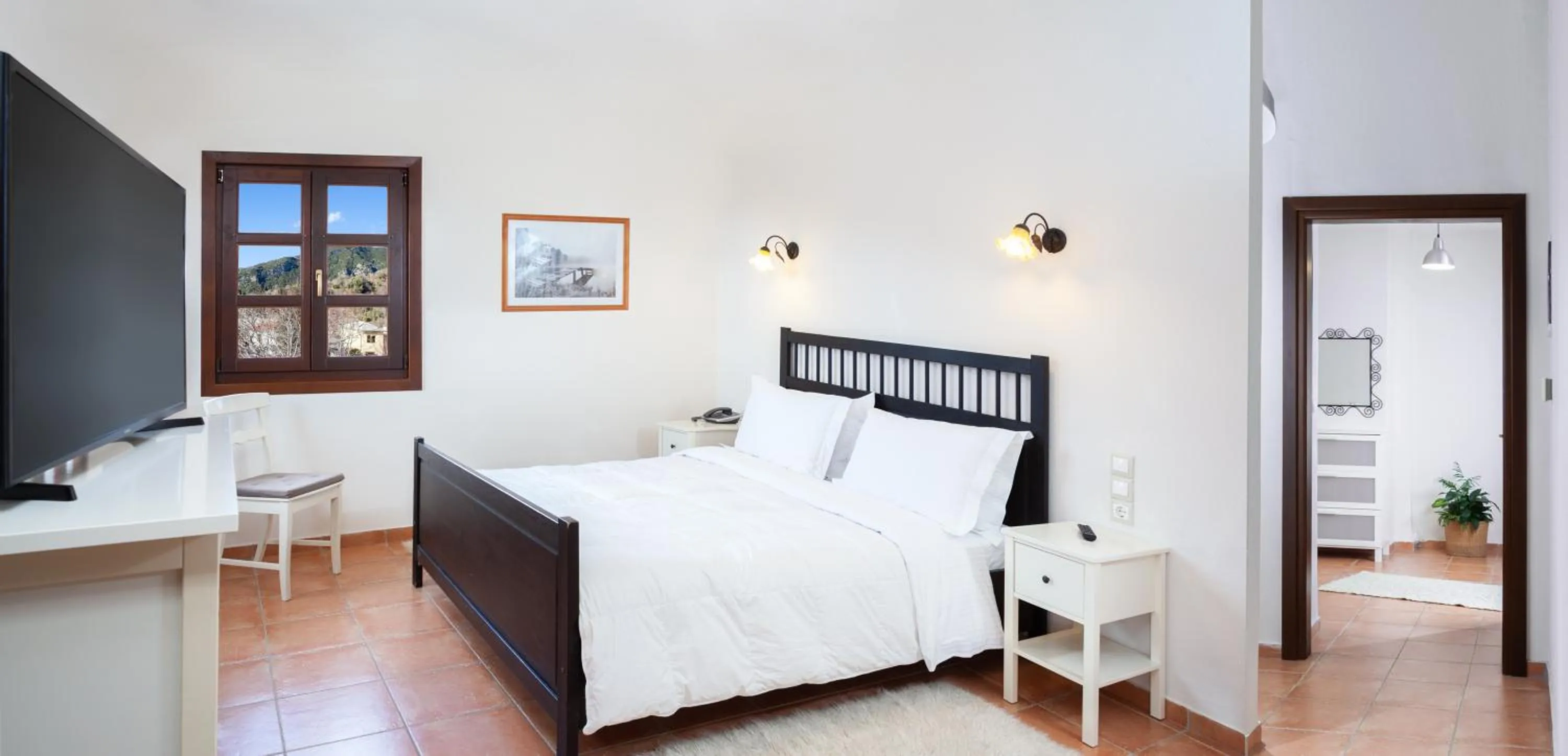 Photo of the whole room, Bed in Erofili Hotel & Suites