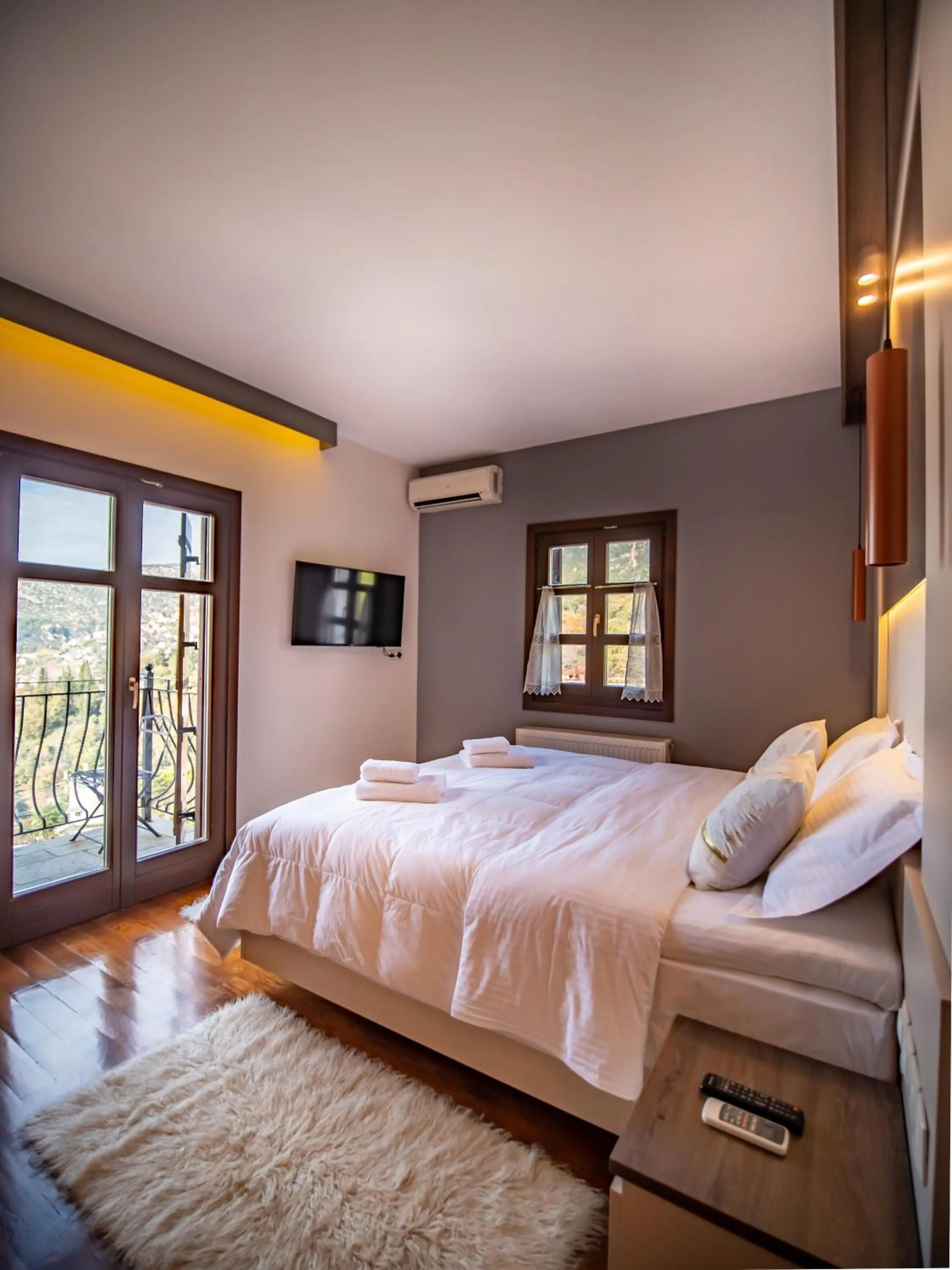 Bed in Erofili Hotel & Suites