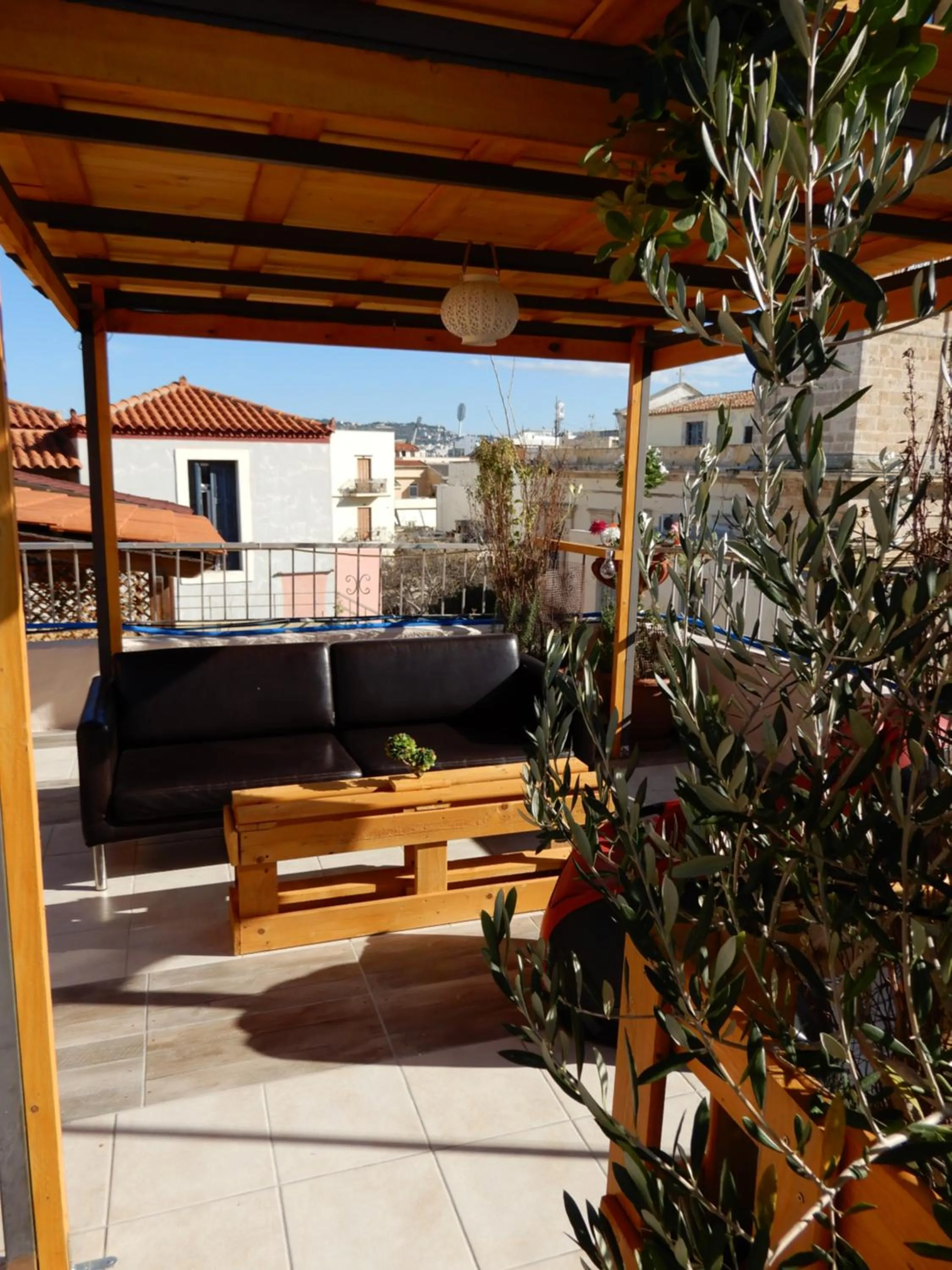 Communal lounge/ TV room in Nikolas Rooms