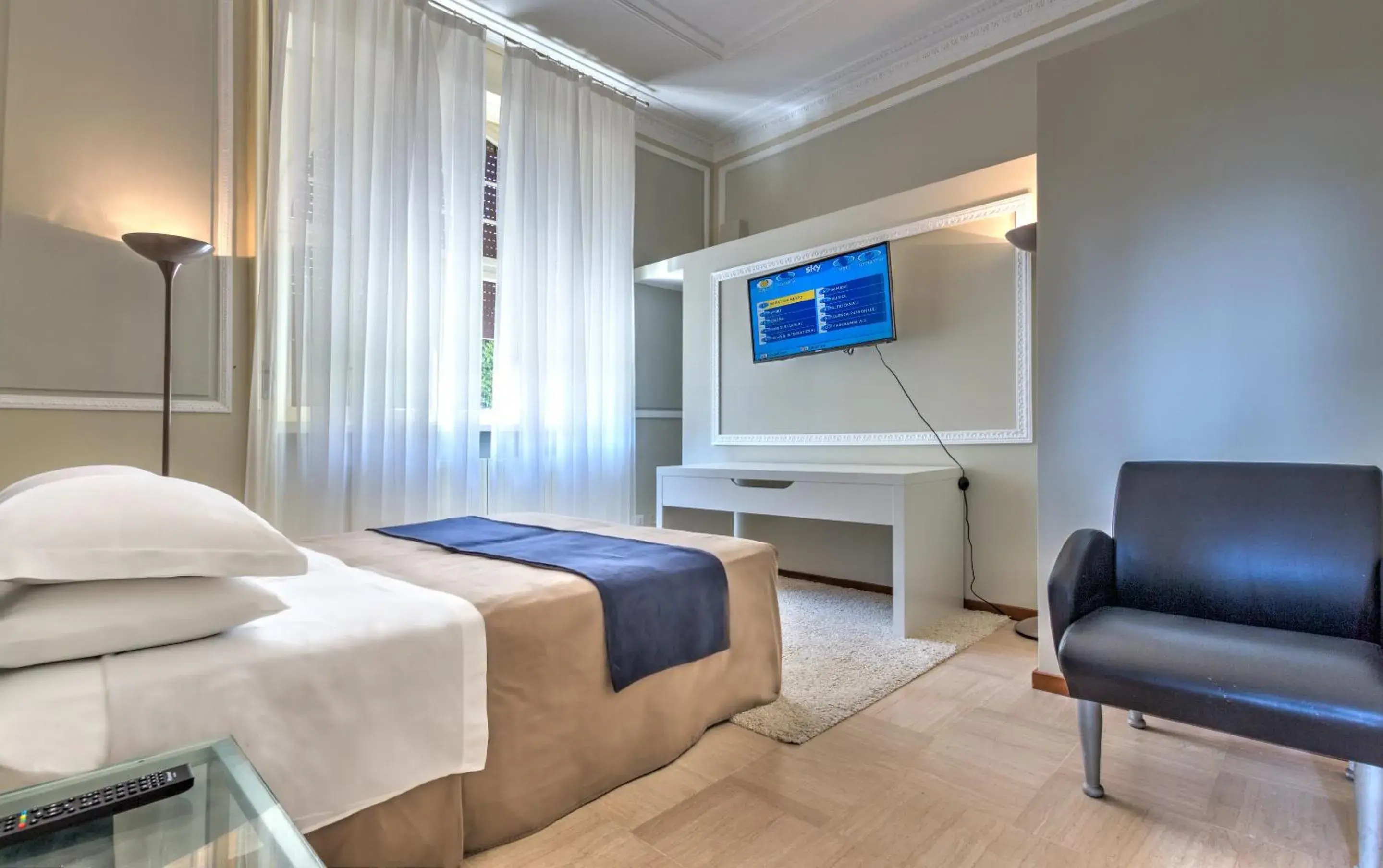 Bed in RAME' Suites