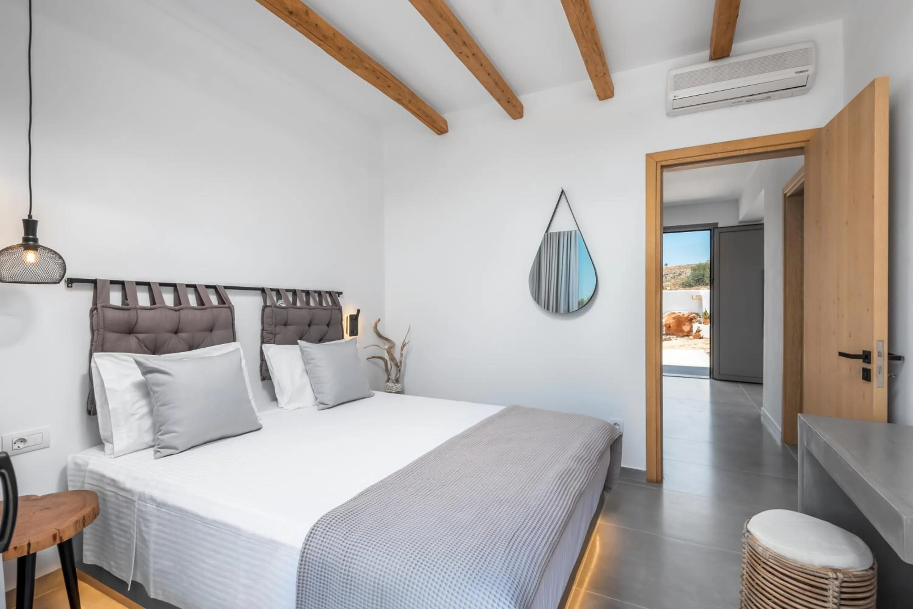 Bed in Celestial Lindos Suites