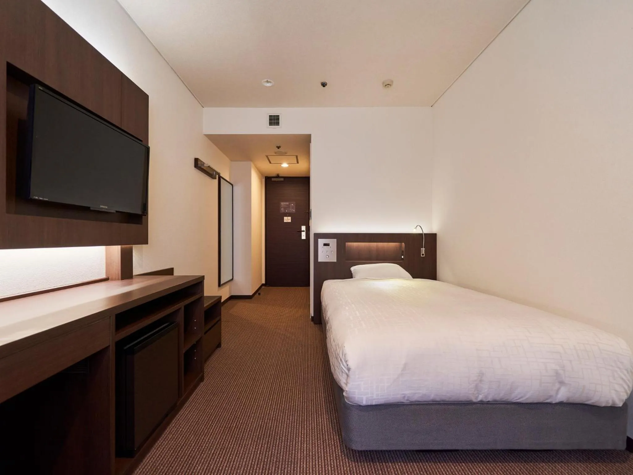 Bed in Princess Garden Hotel