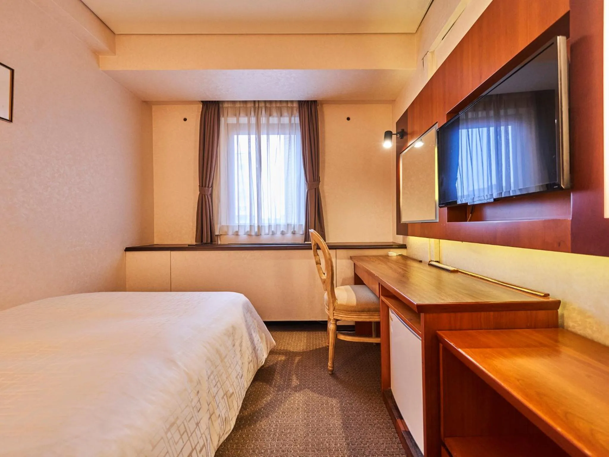 Bed in Princess Garden Hotel