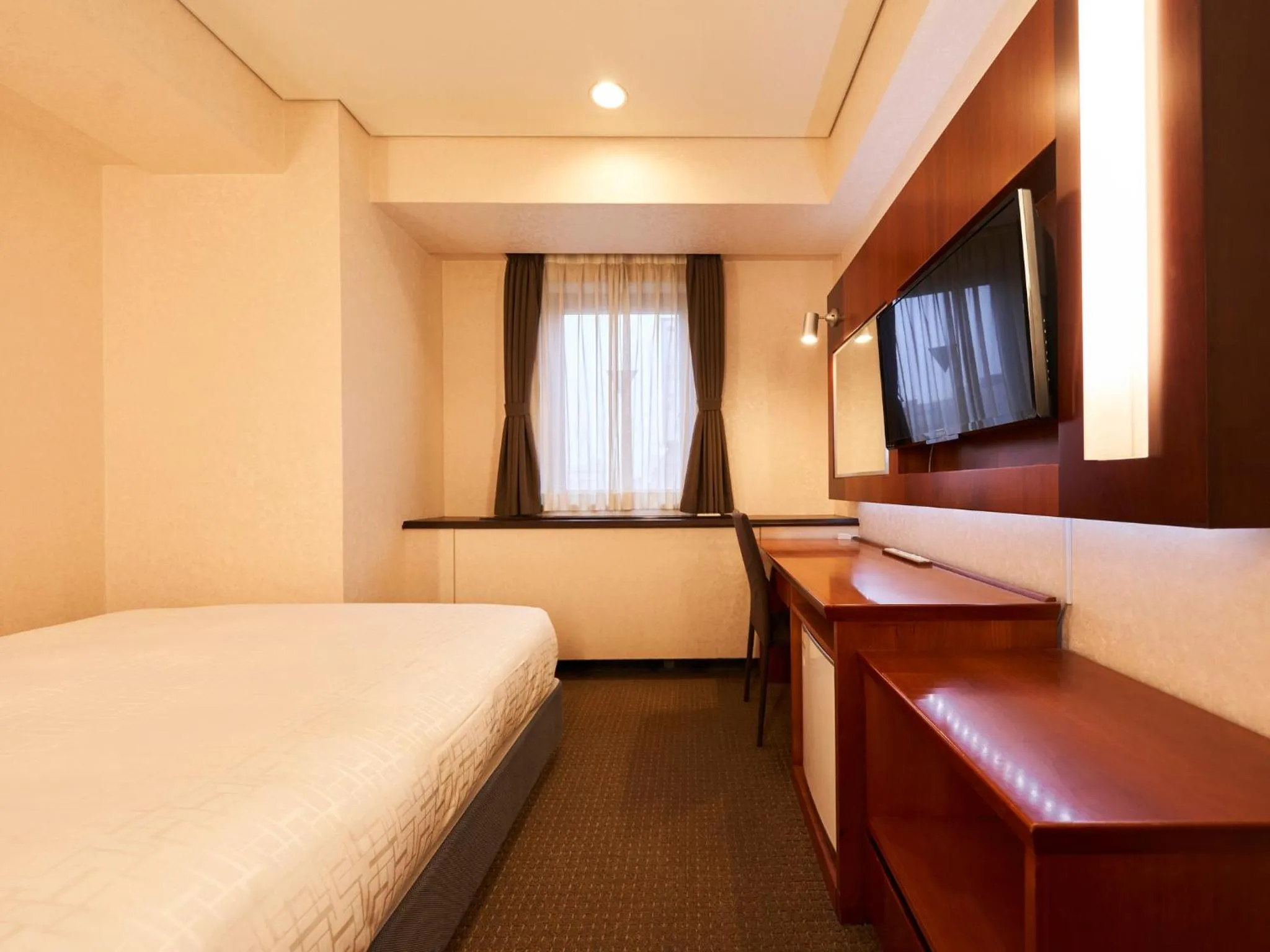 Bed in Princess Garden Hotel