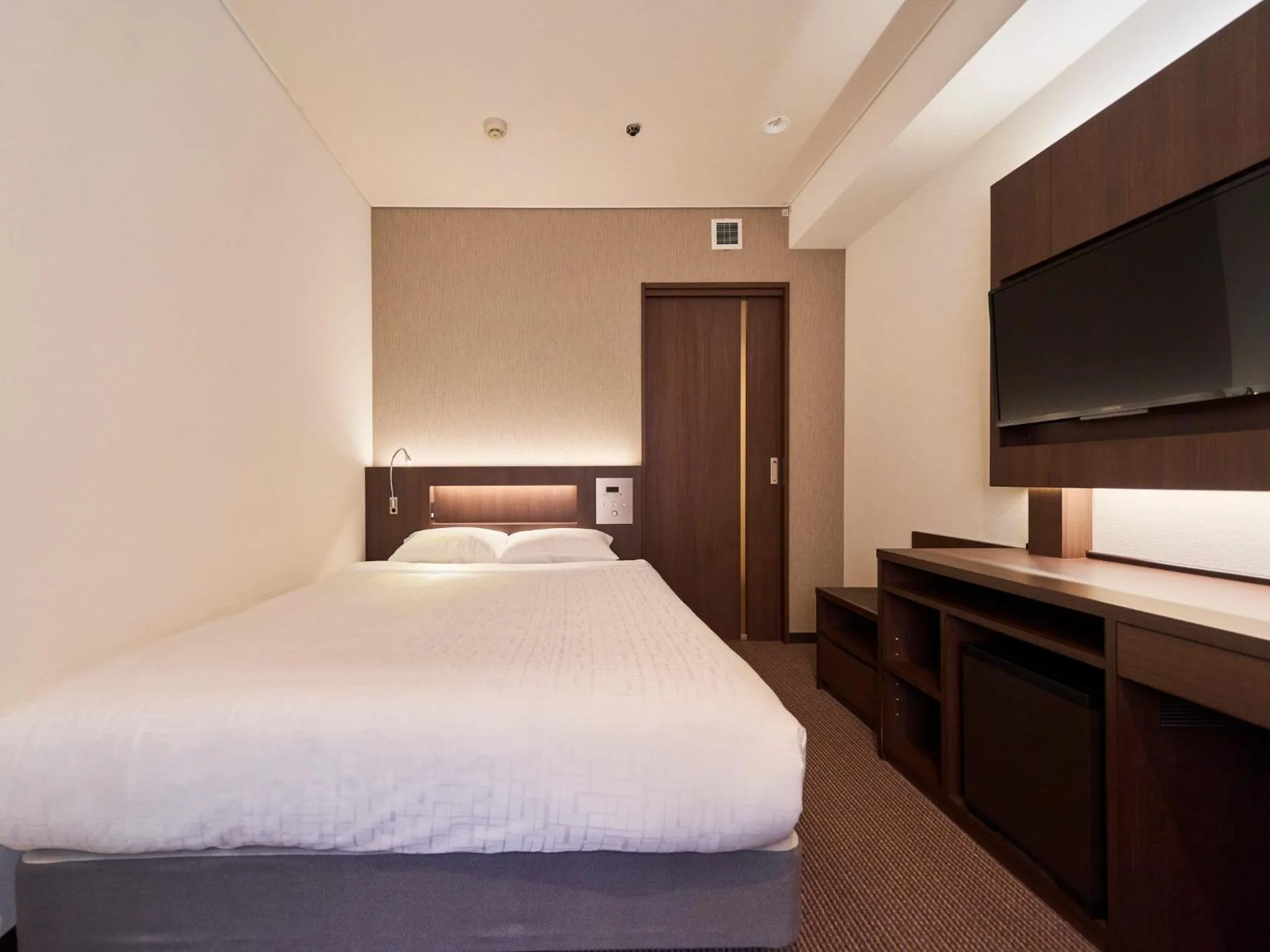 Bed in Princess Garden Hotel