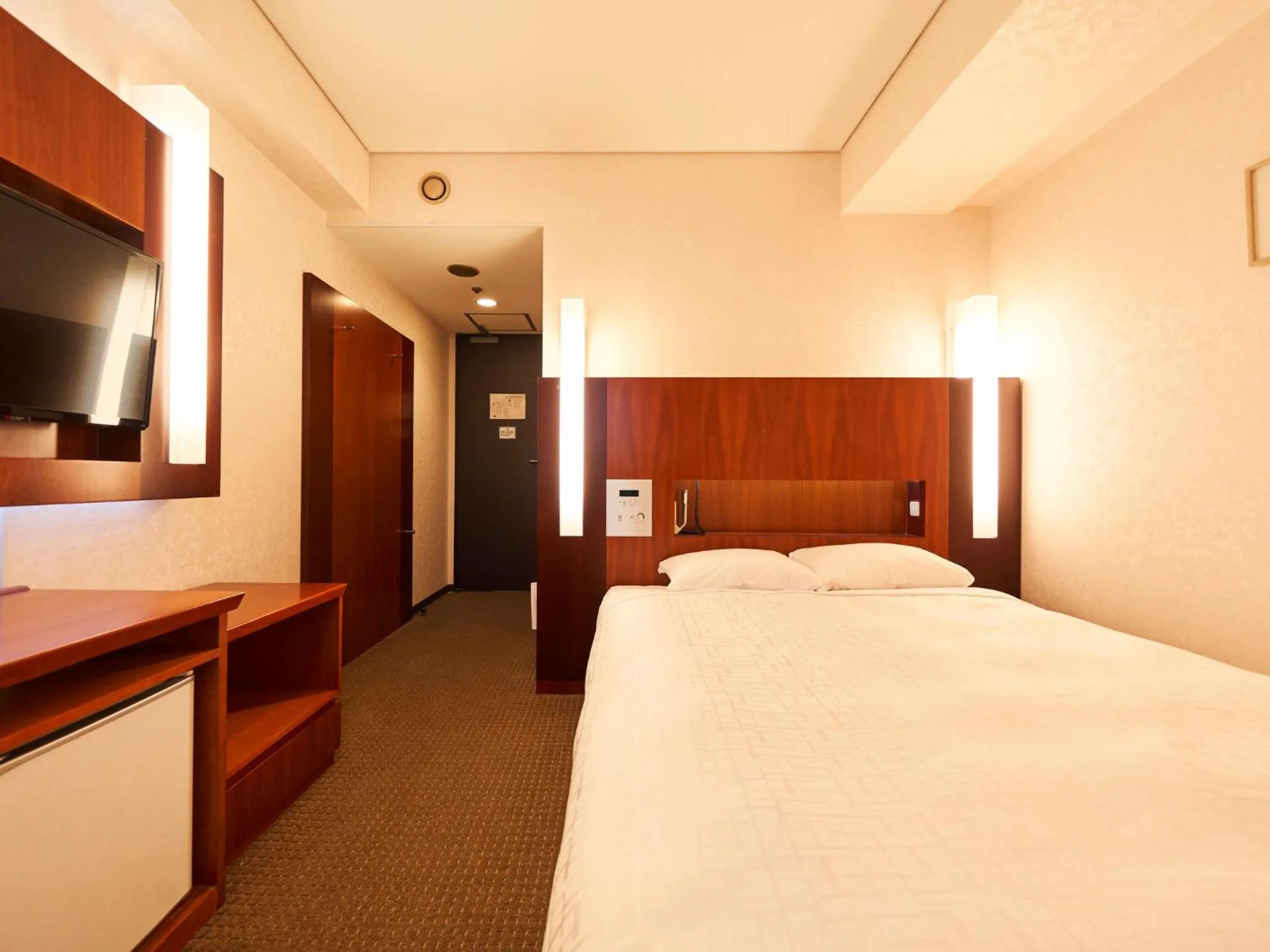 Bed in Princess Garden Hotel