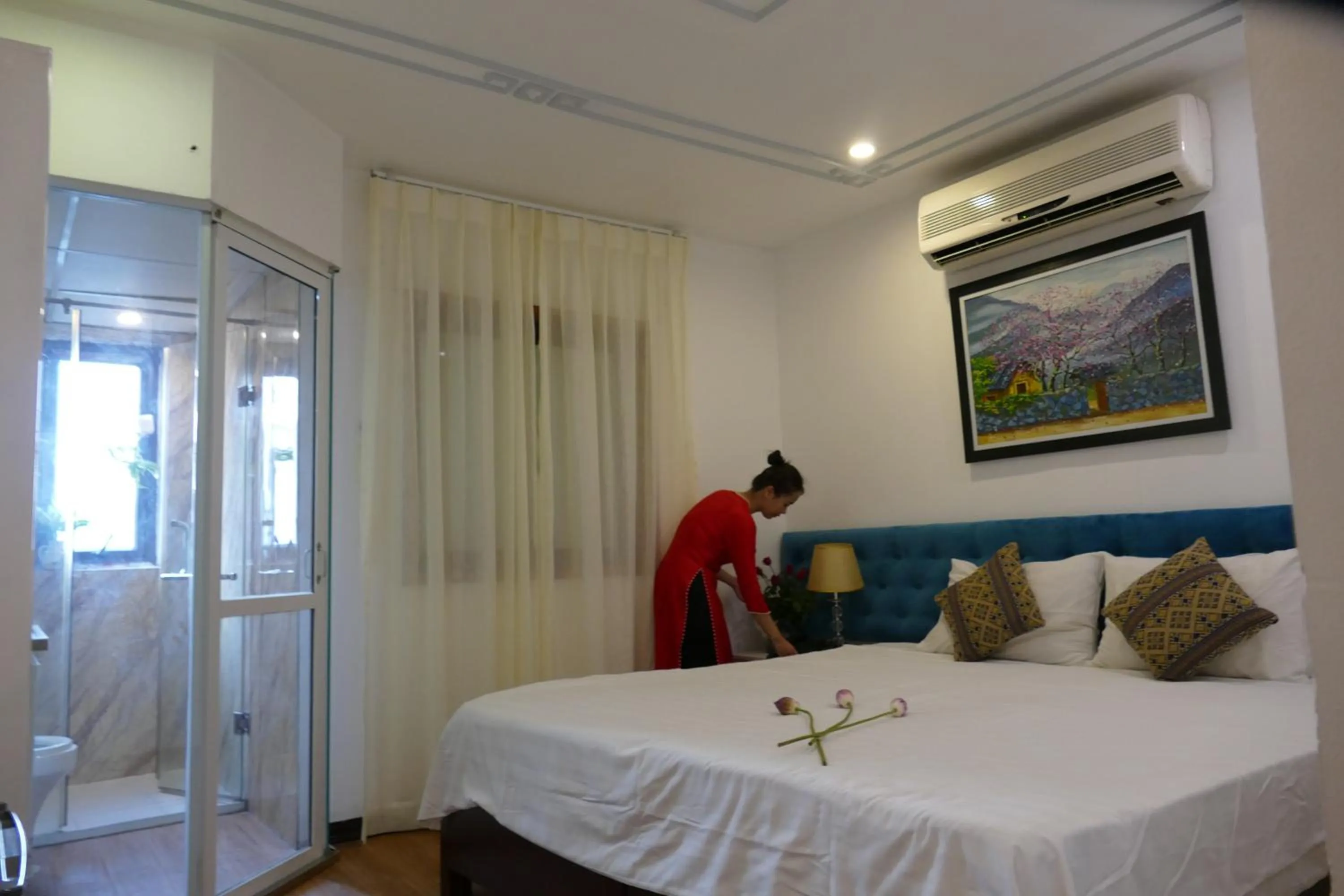 Bed in Maison d'Hanoi Hotel