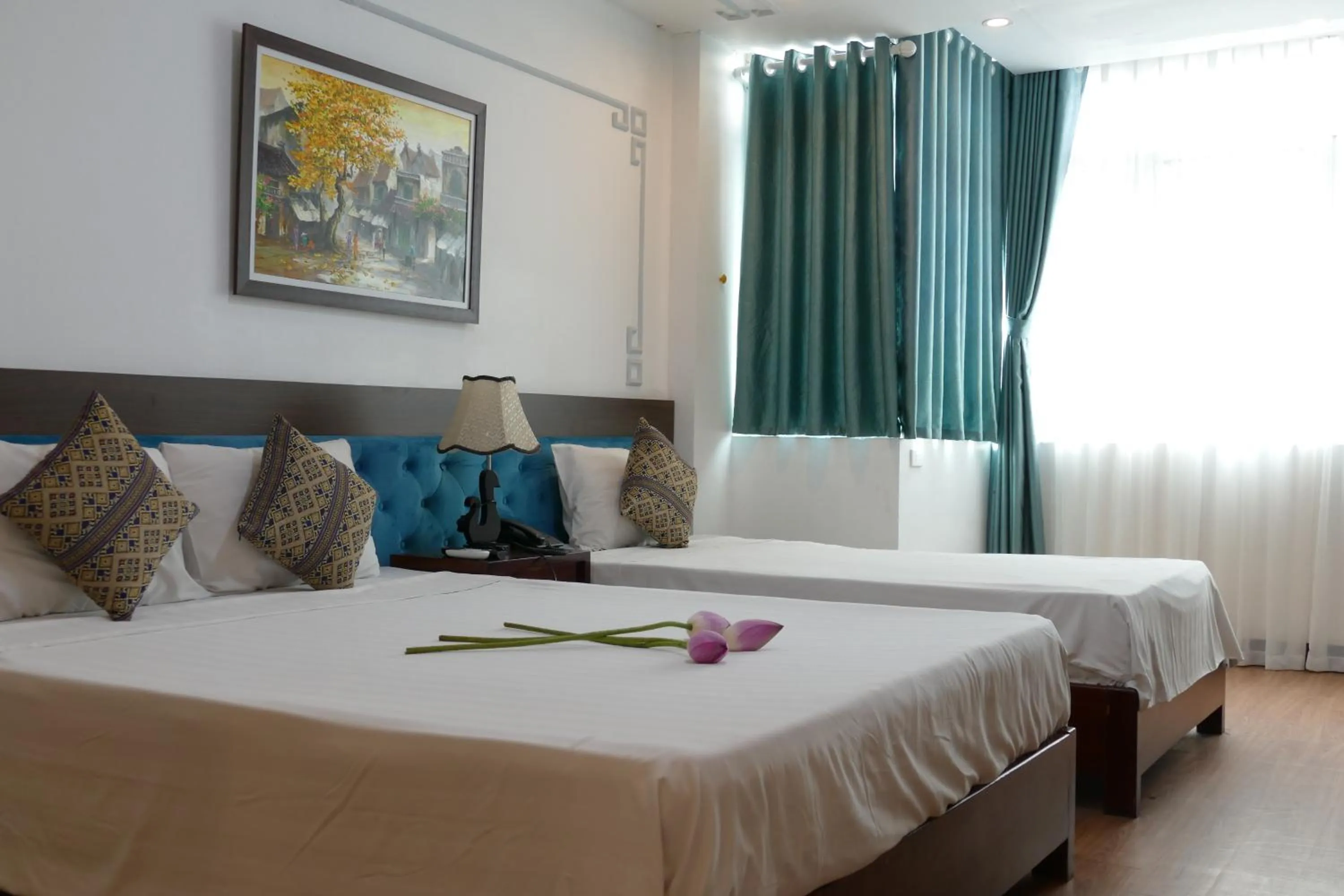 Bed in Maison d'Hanoi Hotel