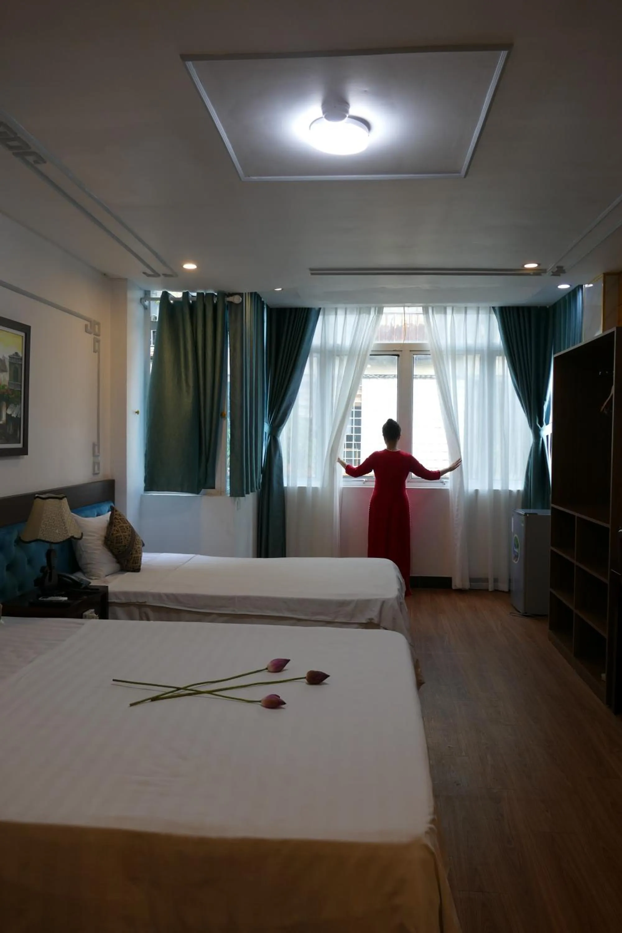 Bed in Maison d'Hanoi Hotel