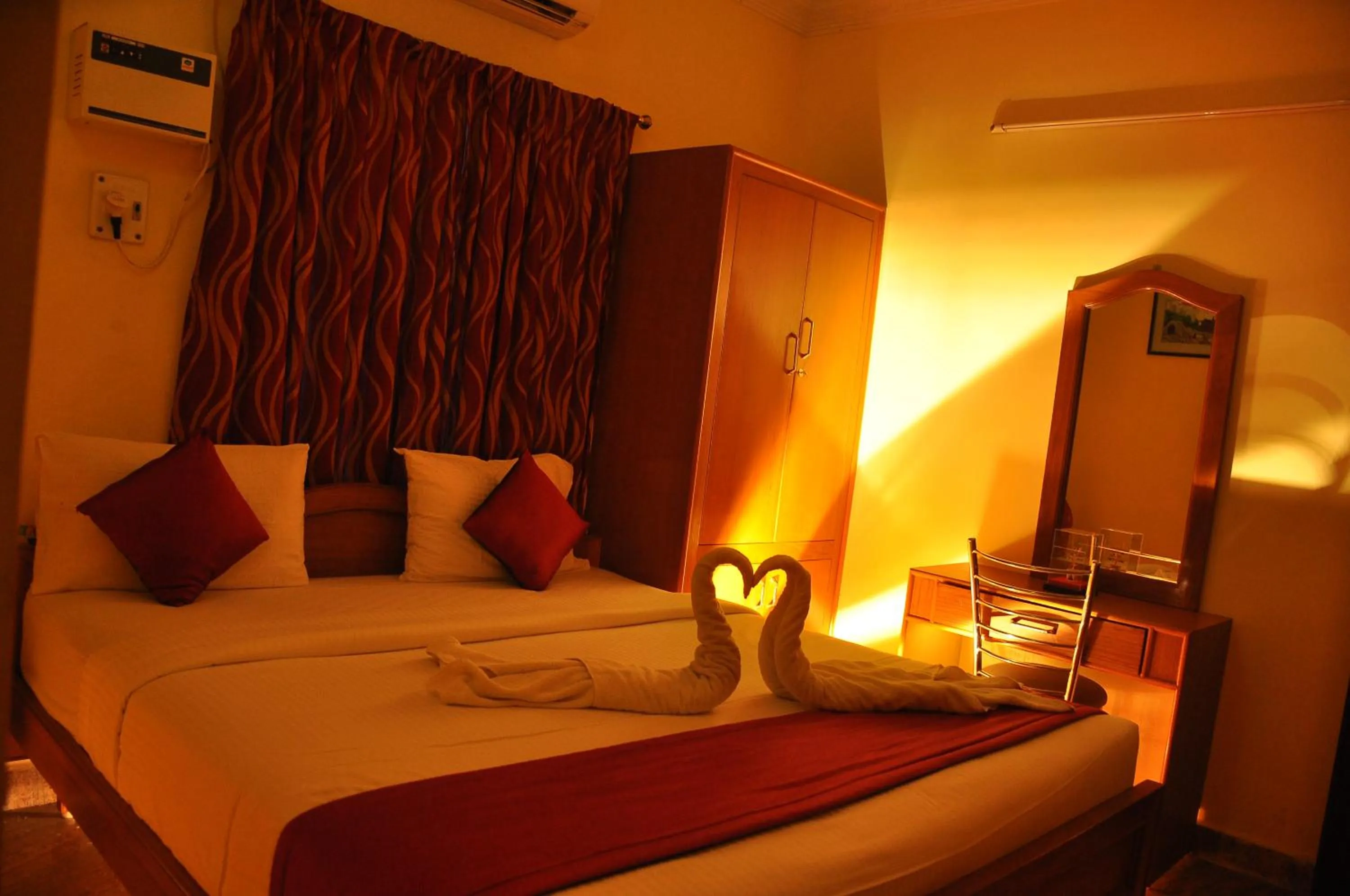 Bed in Green Grande Inn