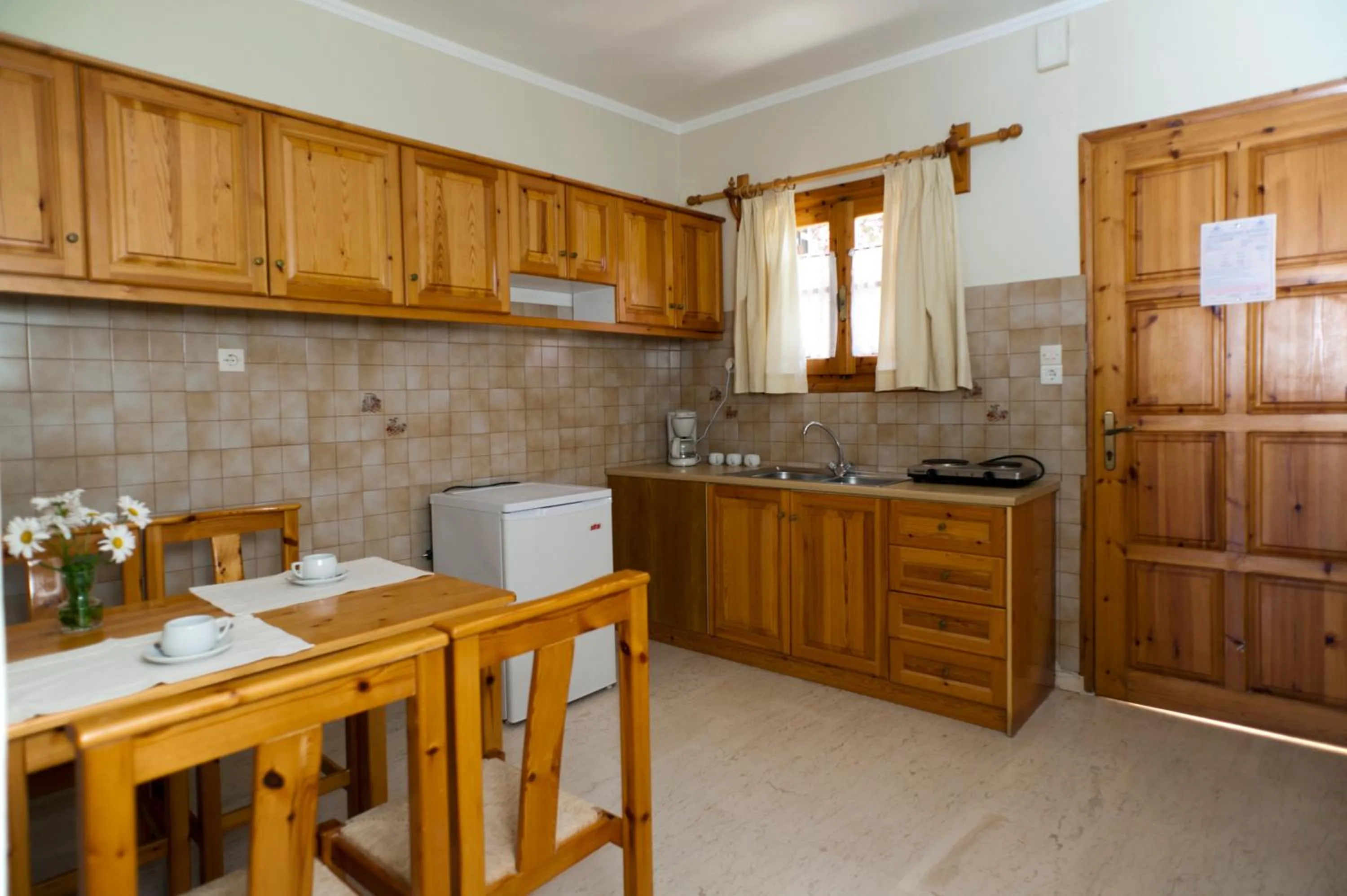 Kitchen or kitchenette in Villa Alexander