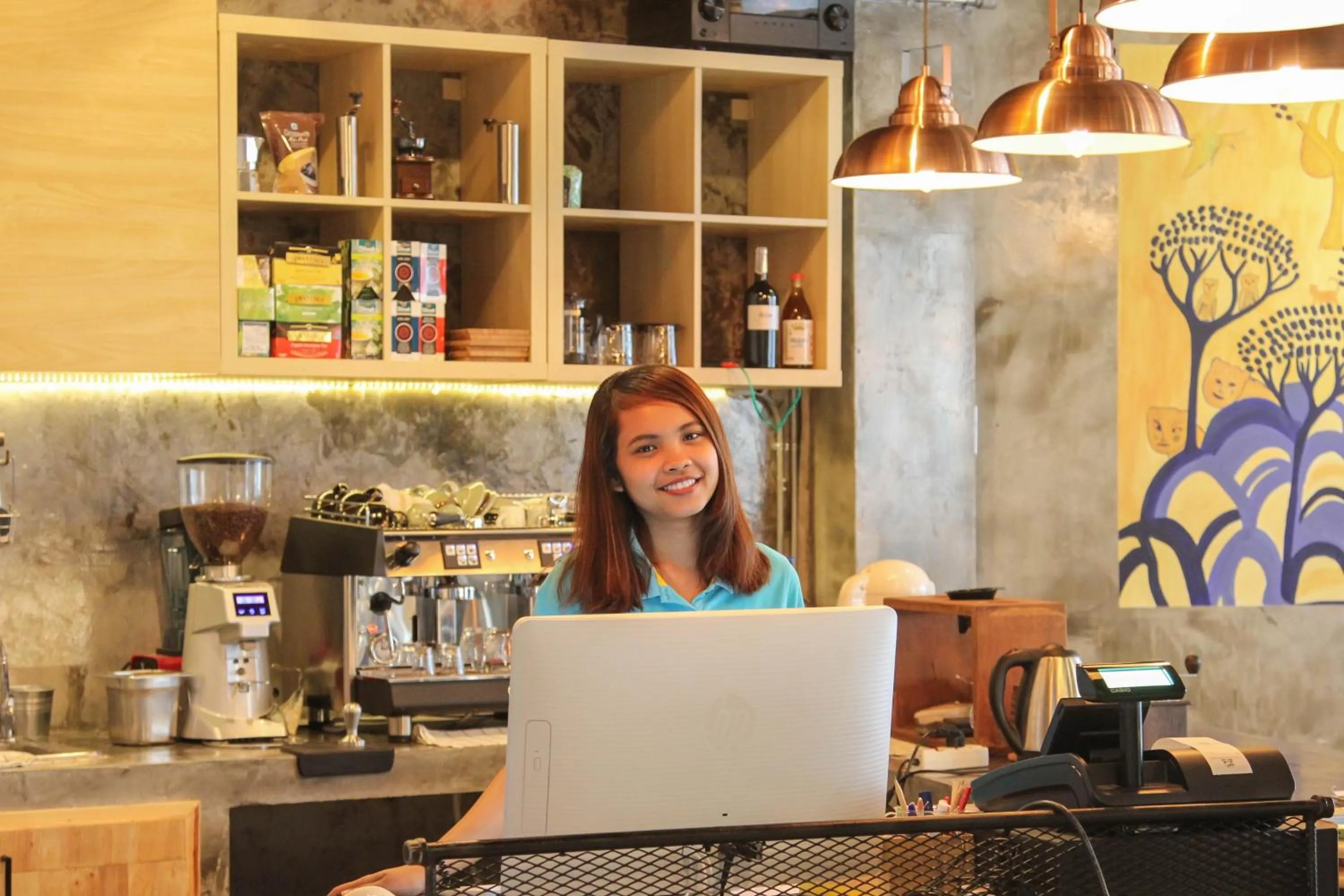 Staff in ThongLor Travellers Hostel and Cafe