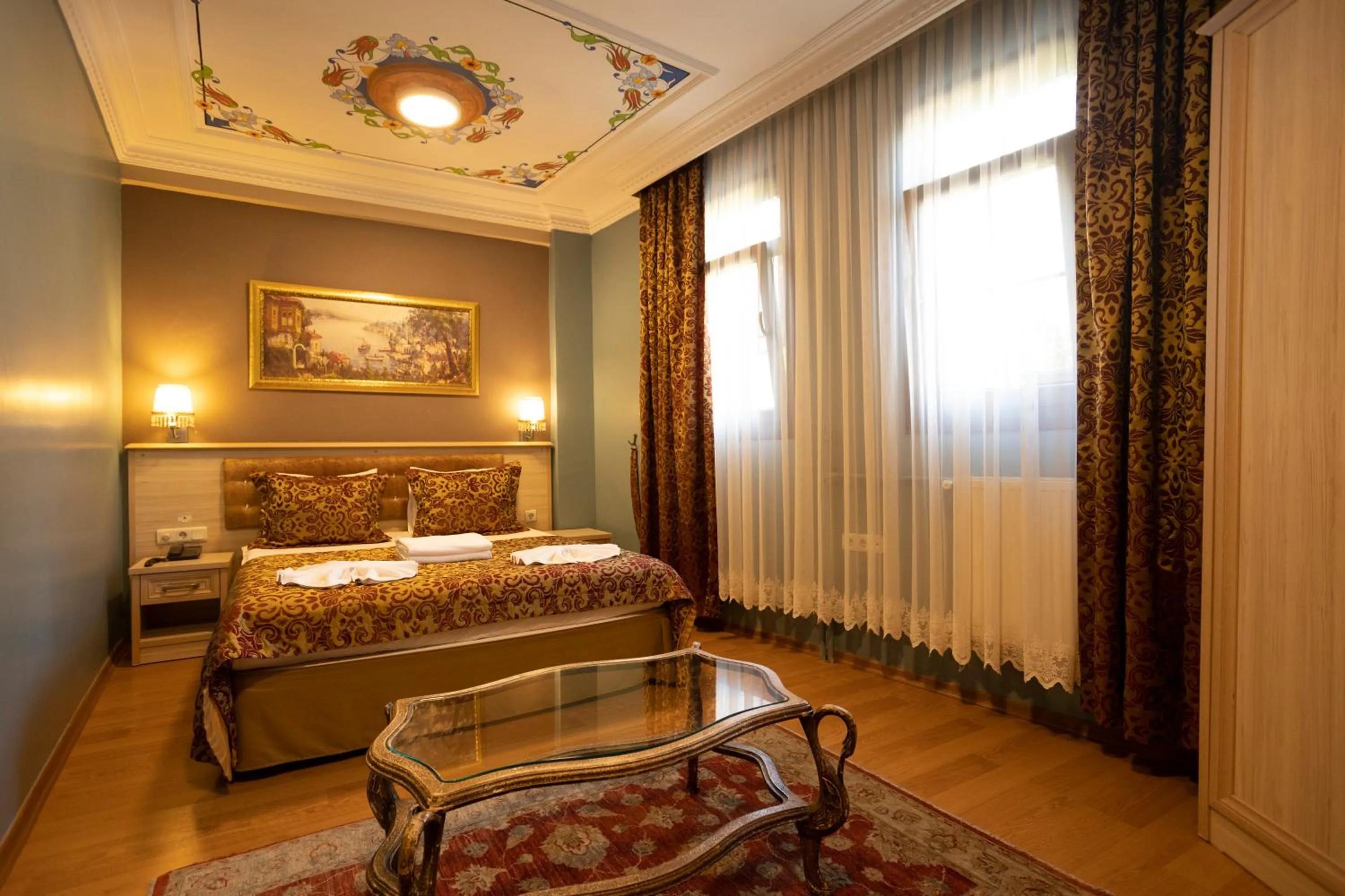 Bed in Tashkonak Studio Suites