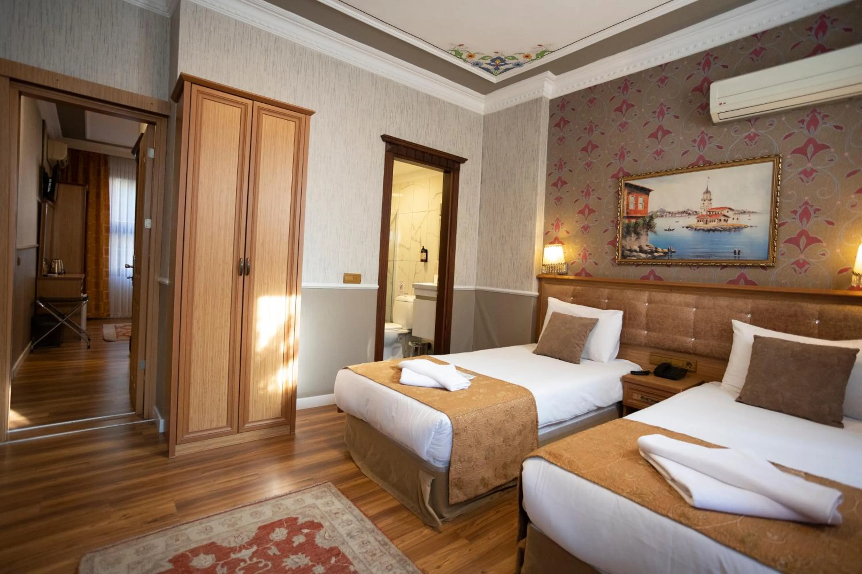 Bed in Tashkonak Studio Suites