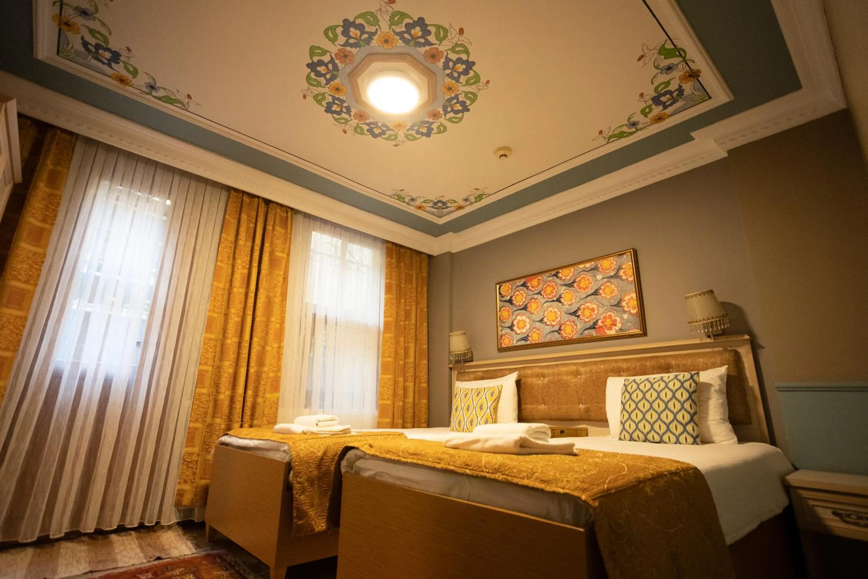 Bed in Tashkonak Studio Suites