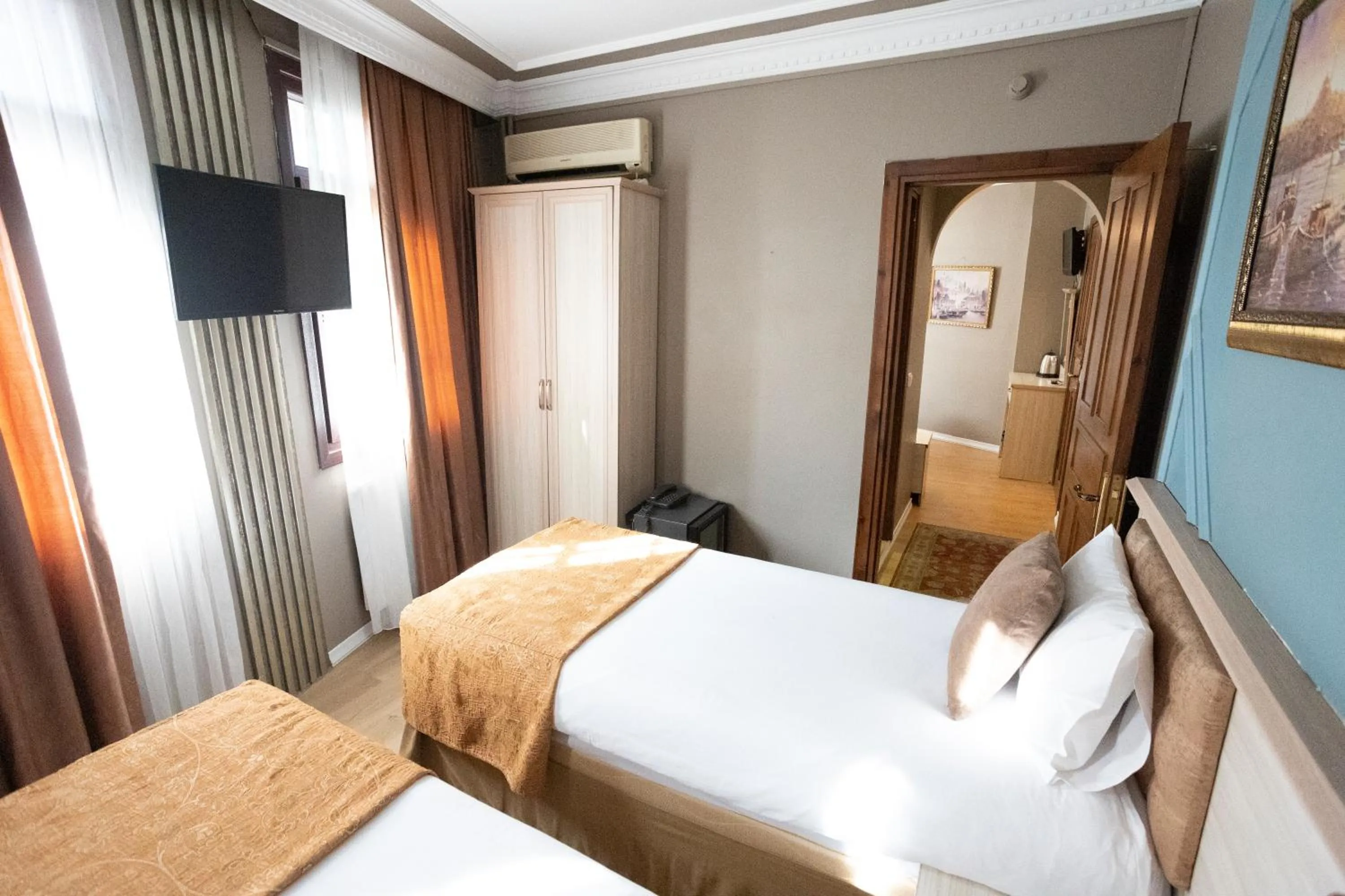 Bed in Tashkonak Studio Suites