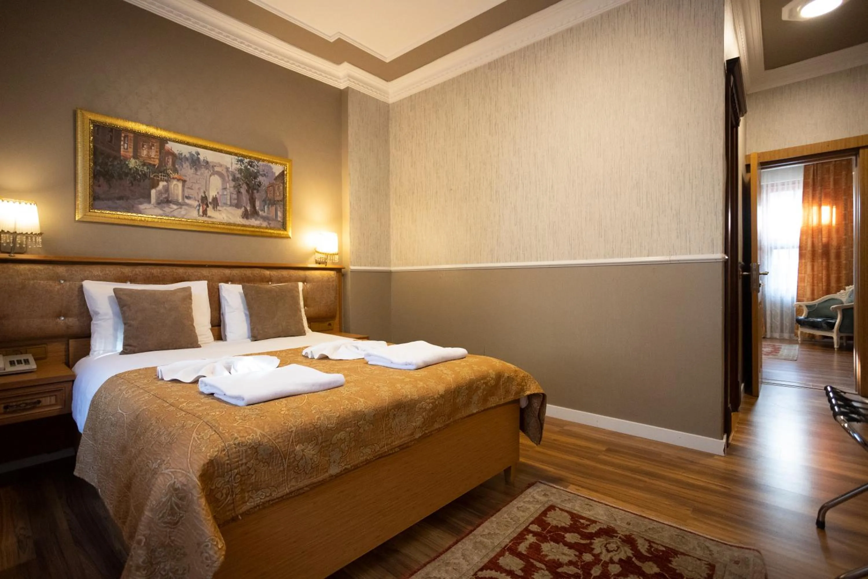 Bed in Tashkonak Studio Suites