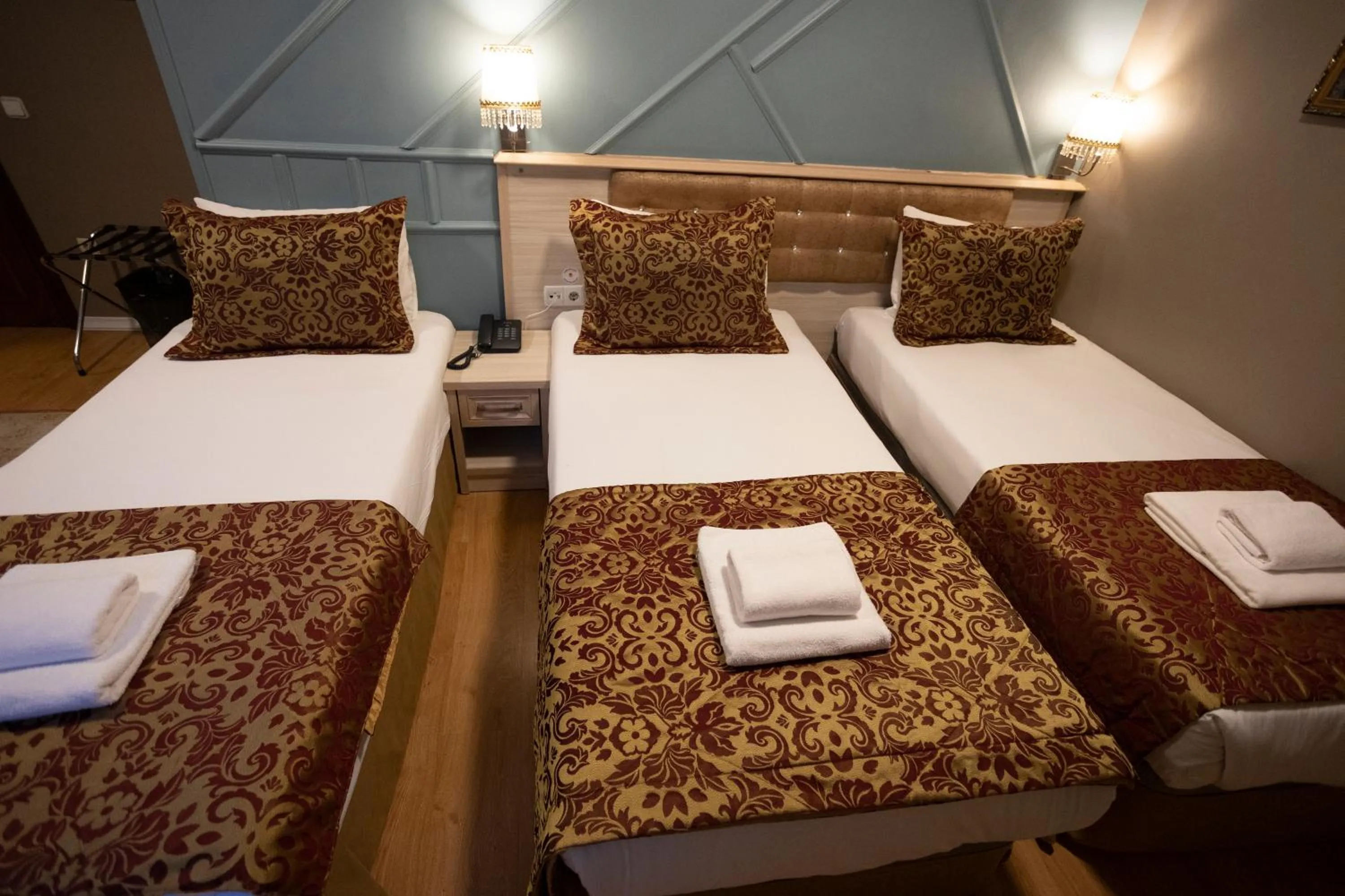 Bed in Tashkonak Studio Suites