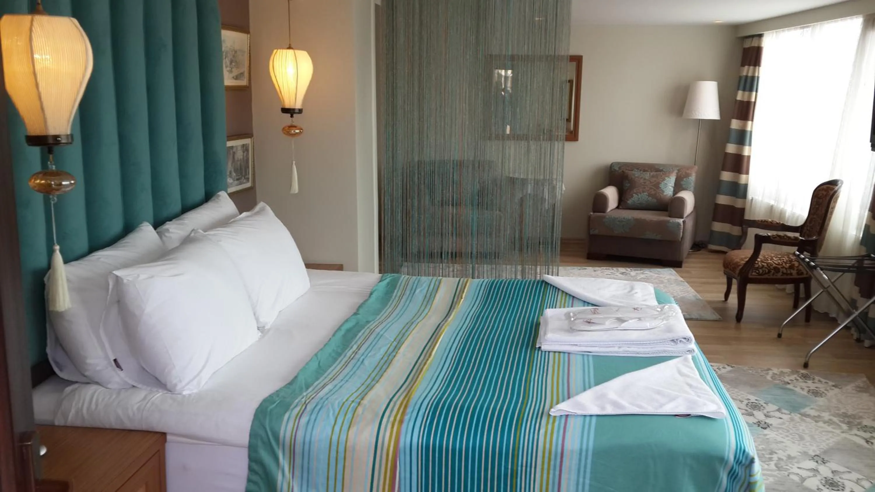 Bedroom, Bed in Tashkonak Studio Suites