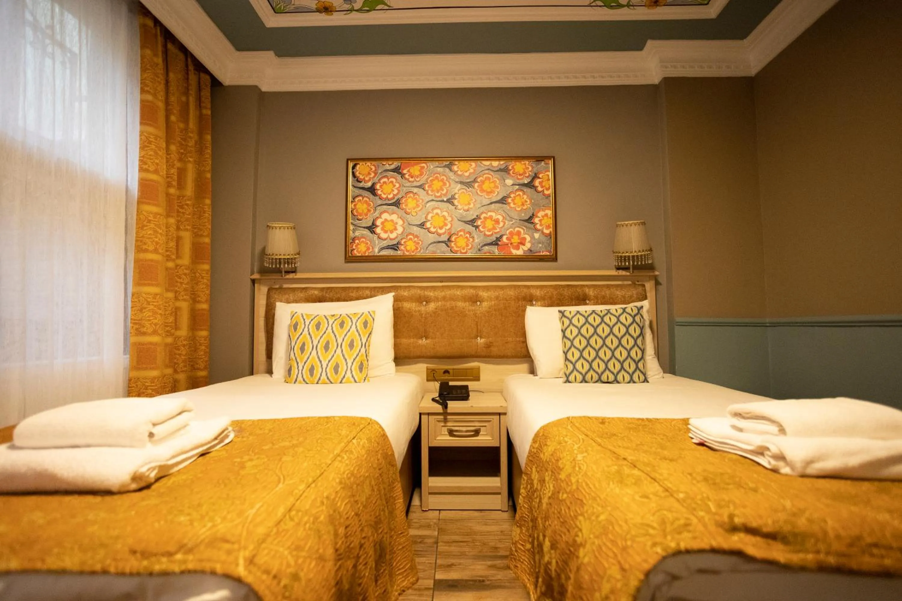 Bed in Tashkonak Studio Suites