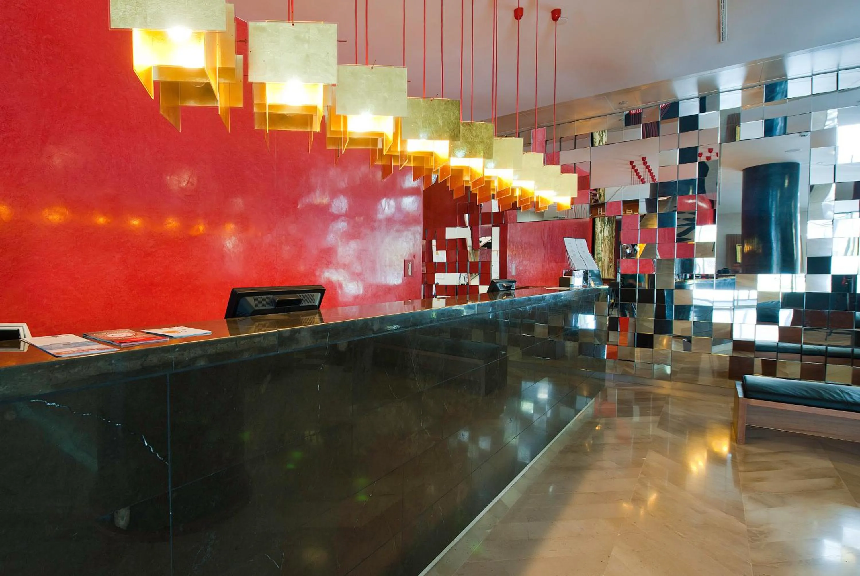 Lobby or reception in Hotel Reina Petronila