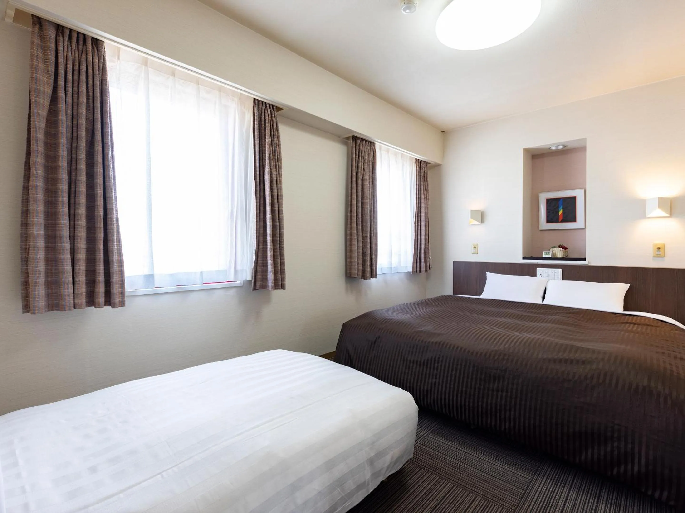 Photo of the whole room, Bed in KOKO STAY Izumi - formerly Hotel Wing International Izumi