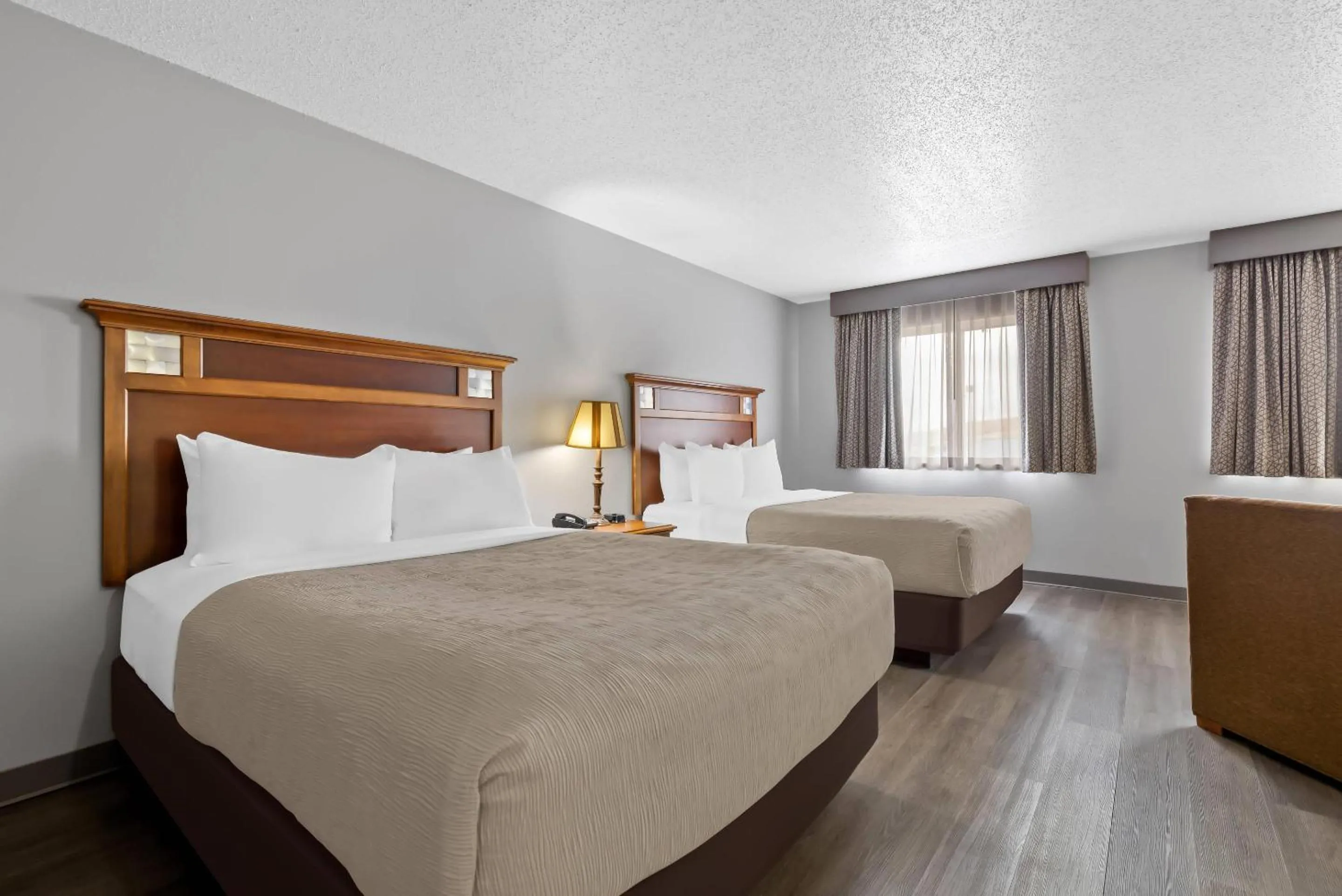 Bedroom, Bed in Quality Inn near Monument Health Rapid City Hospital