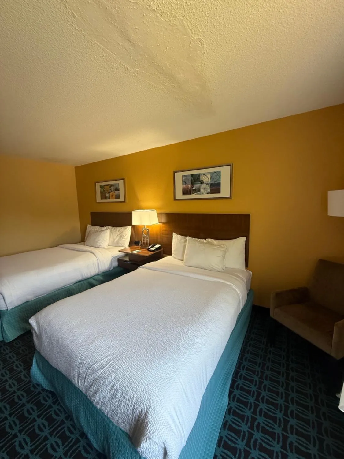 Bed in Fairfield Inn and Suites by Marriott Atlanta Suwanee