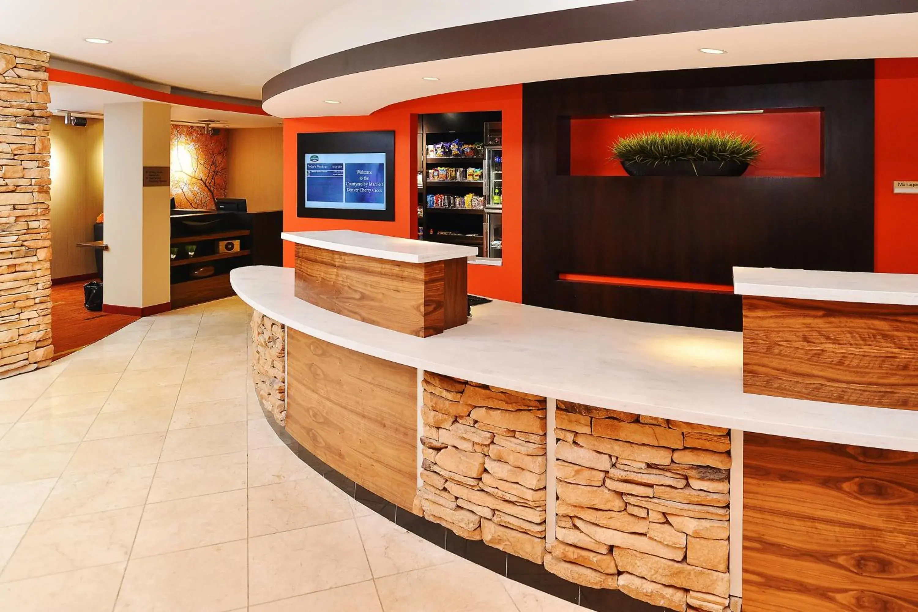 Lobby or reception in Courtyard by Marriott Denver Cherry Creek Lobby or reception in Courtyard by Marriott Denver Cherry Creek