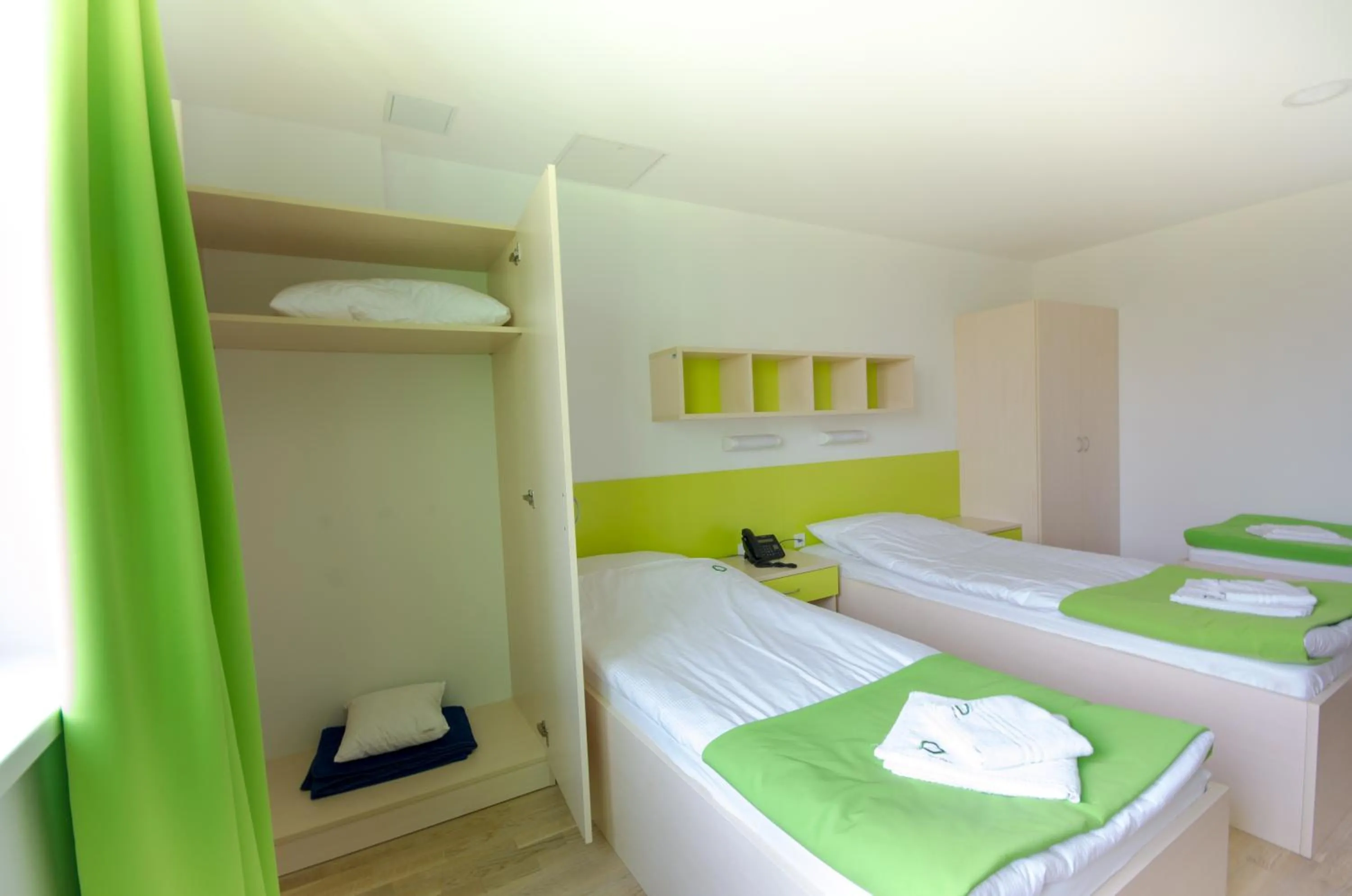 Bed in Sport Hotel Ljubljana