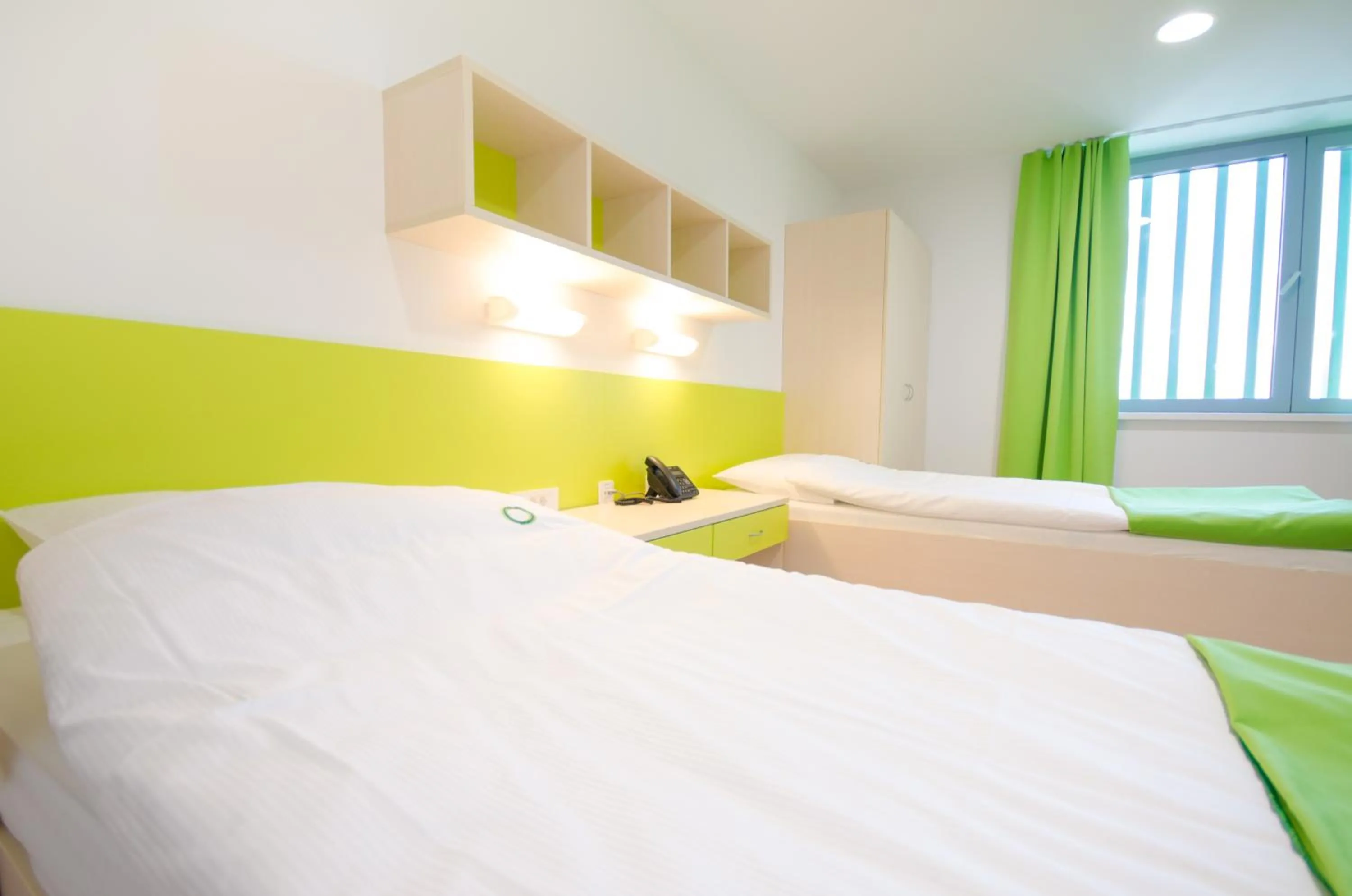 Bed in Sport Hotel Ljubljana