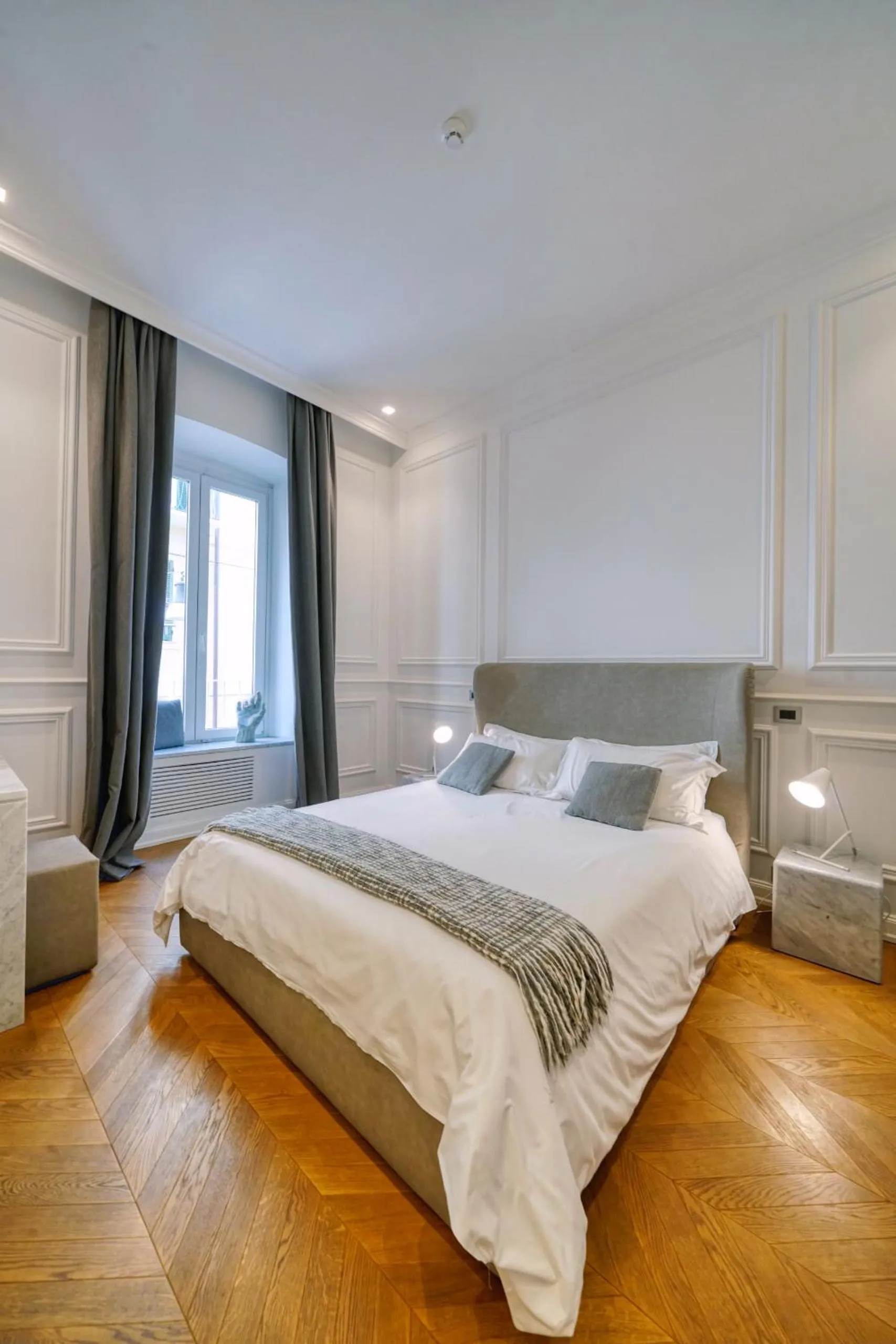 Bed in Via Chiodo Luxury Rooms