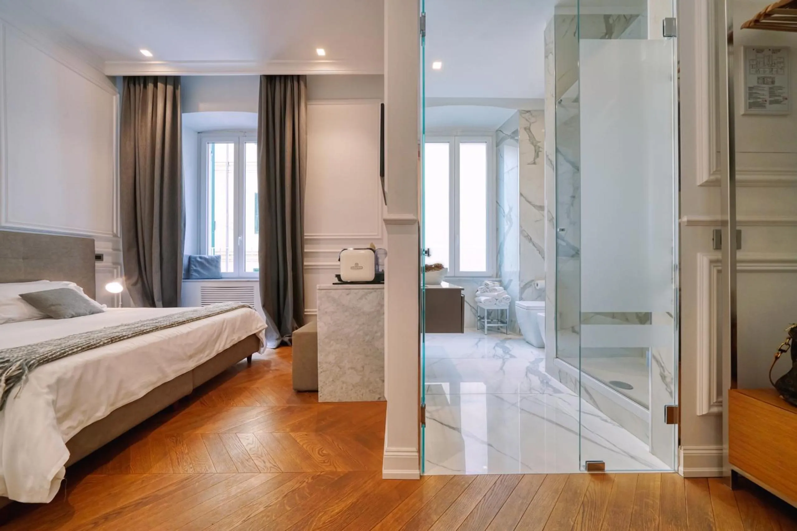 Bed in Via Chiodo Luxury Rooms