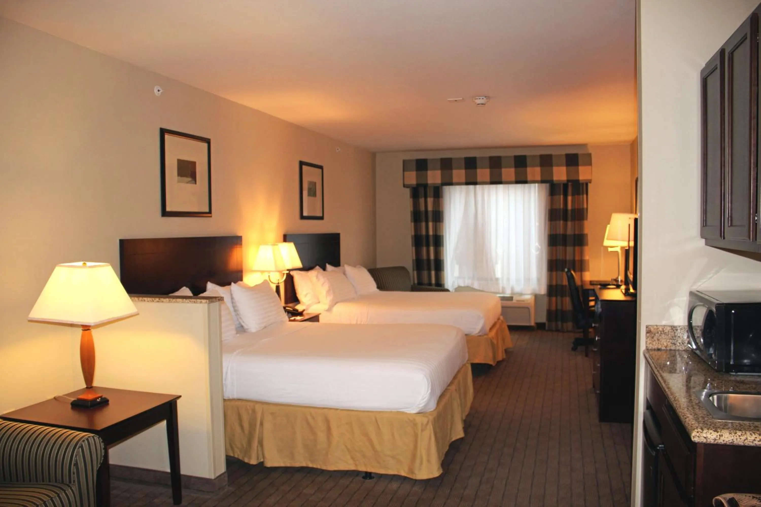Photo of the whole room, Bed in Holiday Inn Express & Suites Syracuse North - Airport Area by IHG