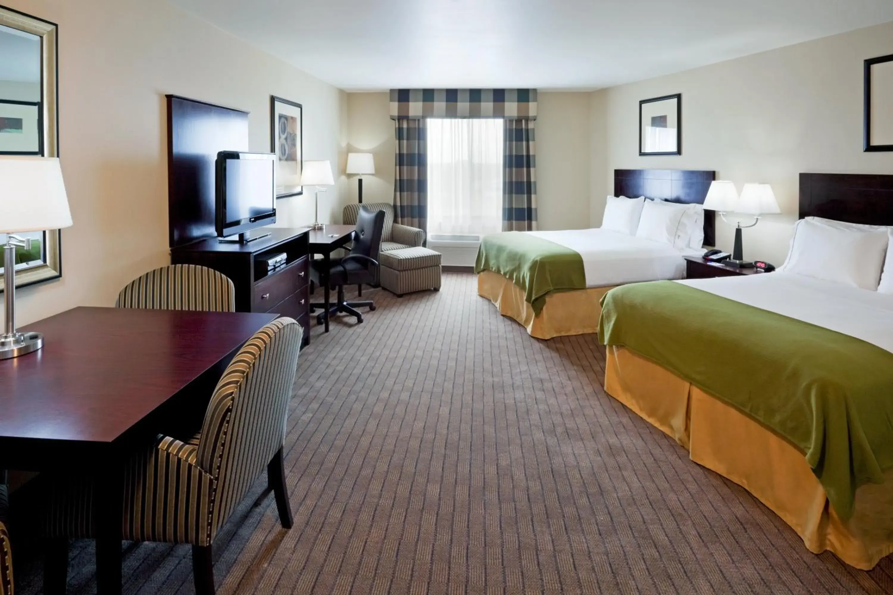 Photo of the whole room, Bed in Holiday Inn Express & Suites Syracuse North - Airport Area by IHG Photo of the whole room, Bed in Holiday Inn Express & Suites Syracuse North - Airport Area by IHG