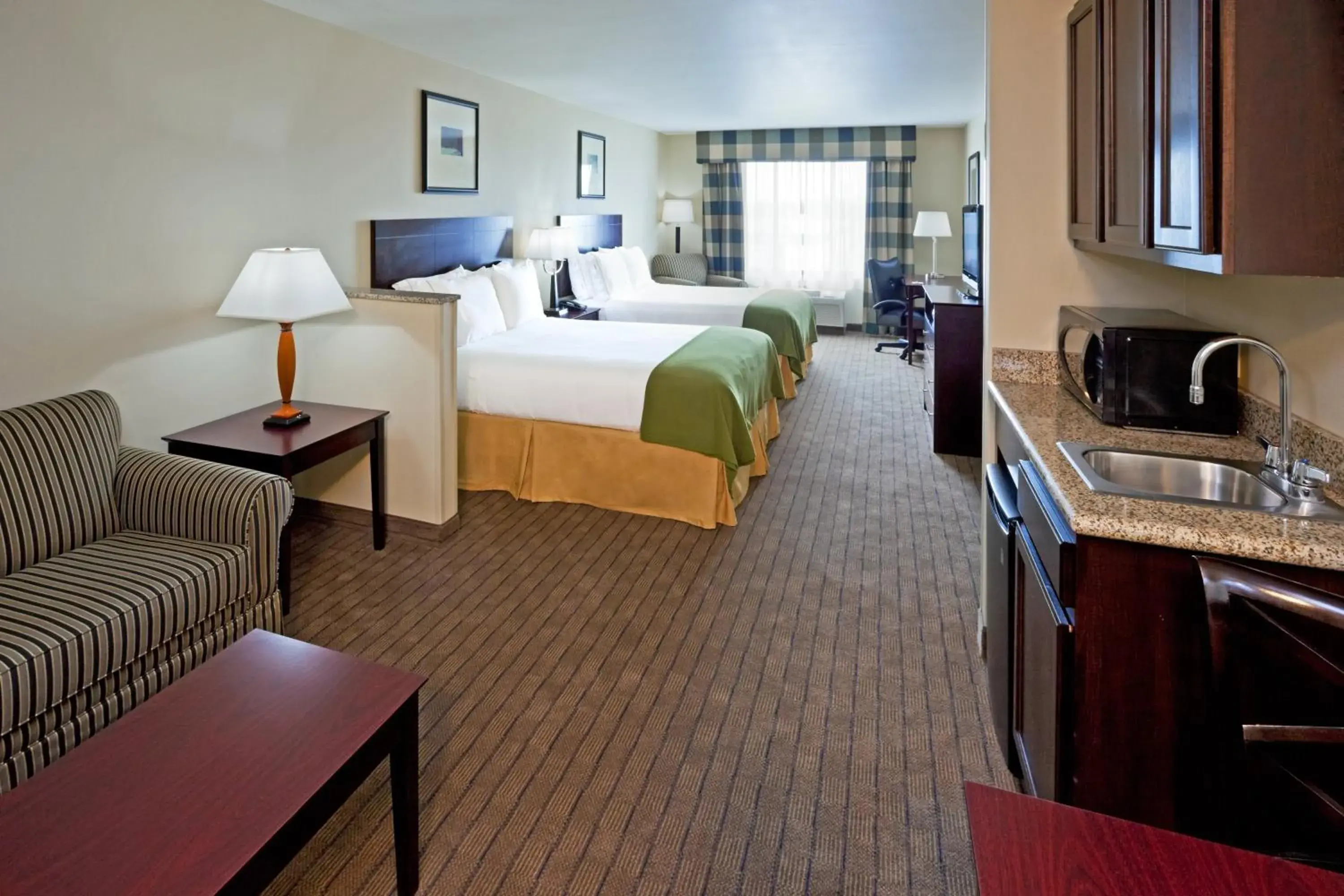 Photo of the whole room, Bed in Holiday Inn Express & Suites Syracuse North - Airport Area by IHG Photo of the whole room, Bed in Holiday Inn Express & Suites Syracuse North - Airport Area by IHG