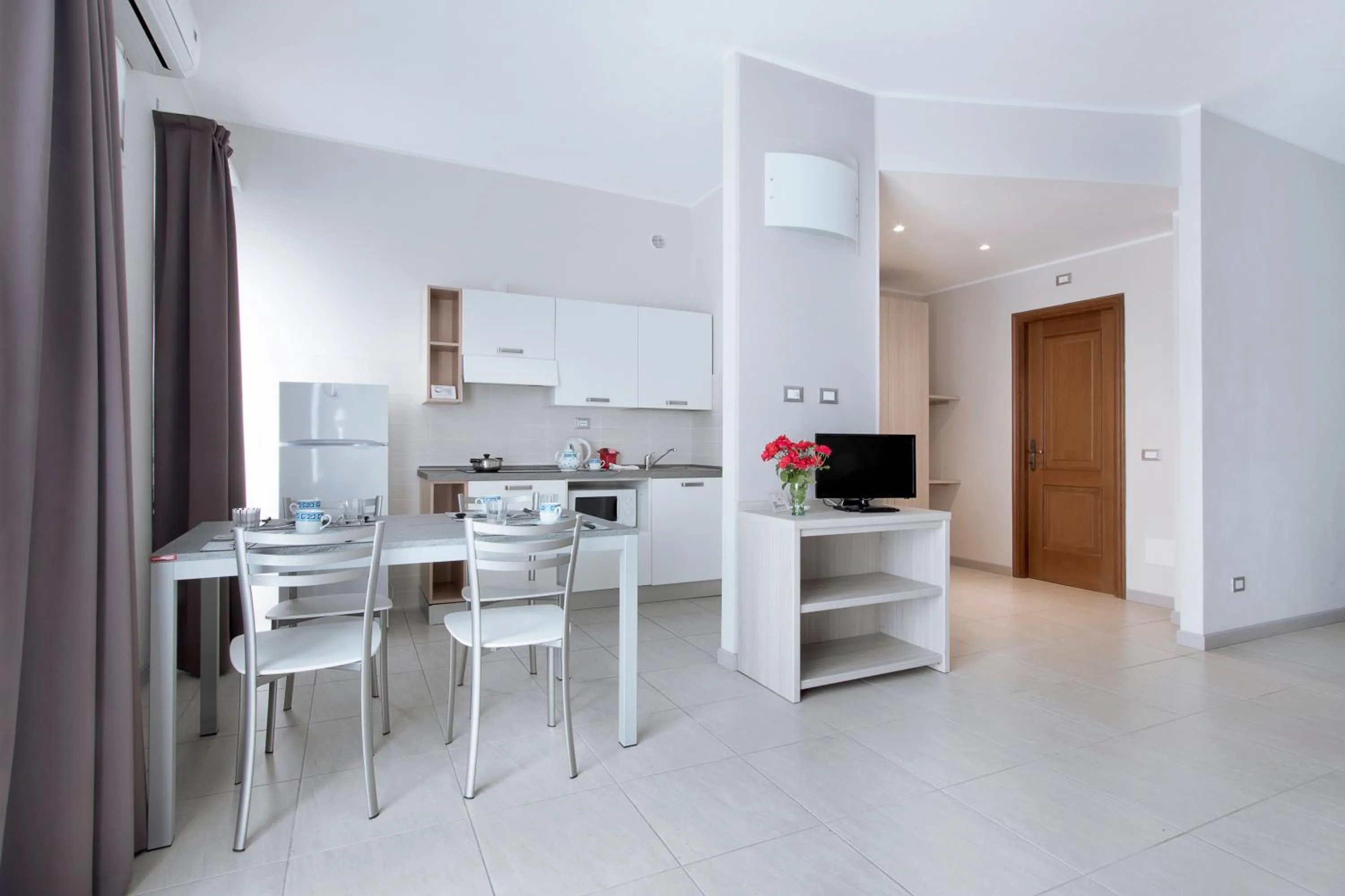 Kitchen or kitchenette in Diano Sporting Apartments