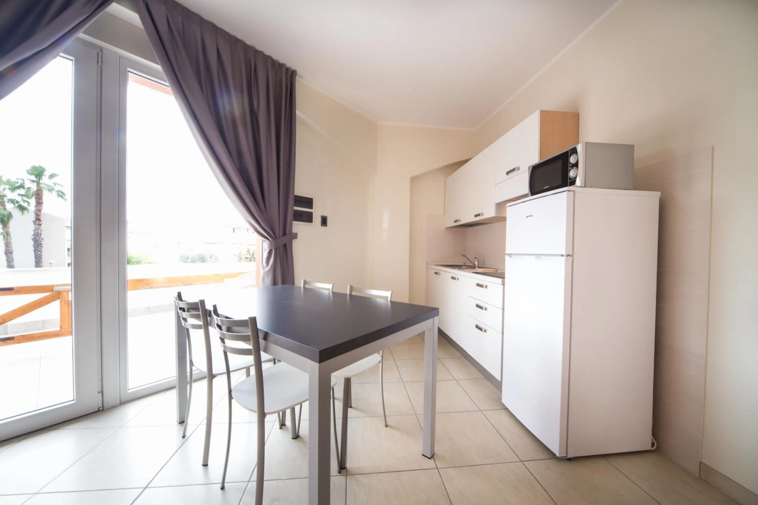 Photo of the whole room in Diano Sporting Apartments