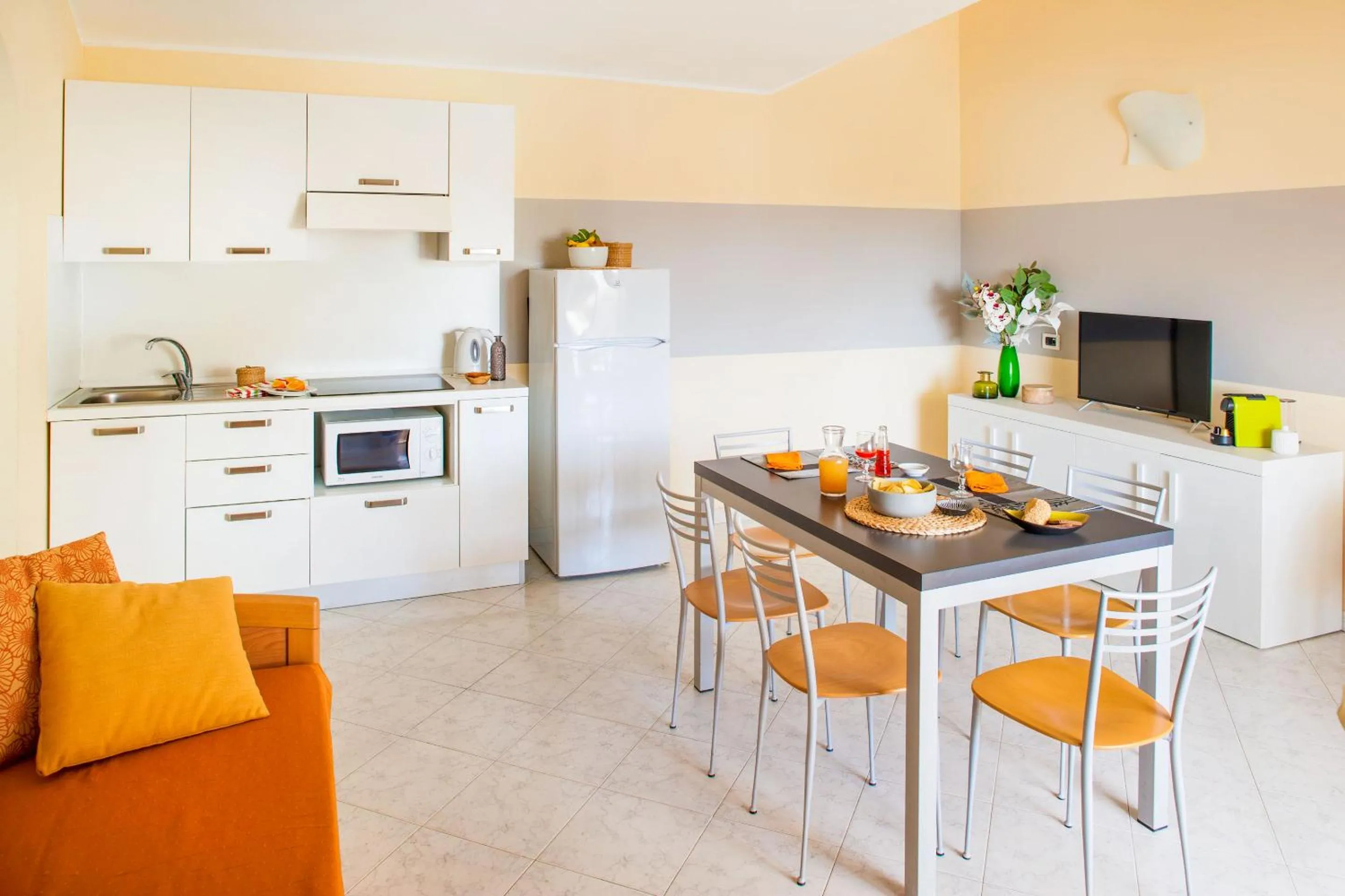 Kitchen or kitchenette in Diano Sporting Apartments