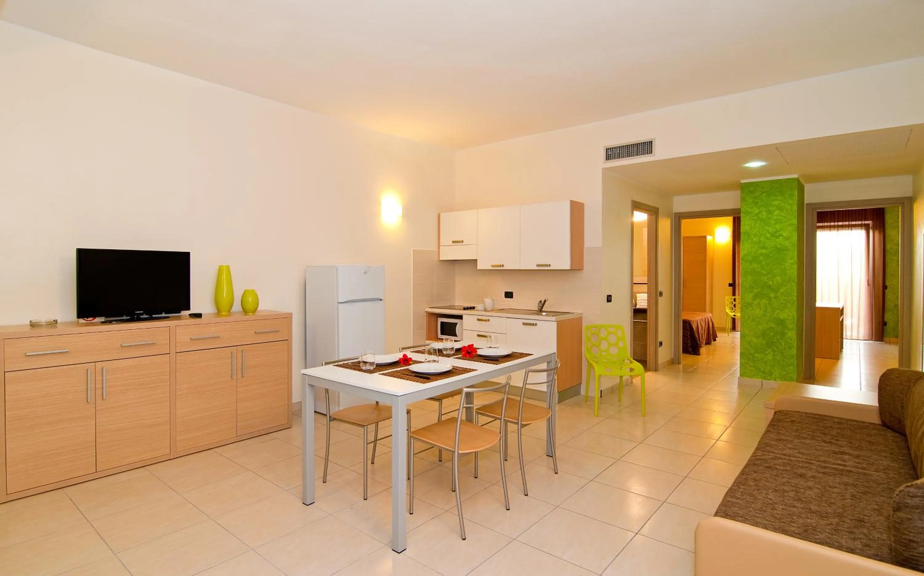 Dining area in Diano Sporting Apartments