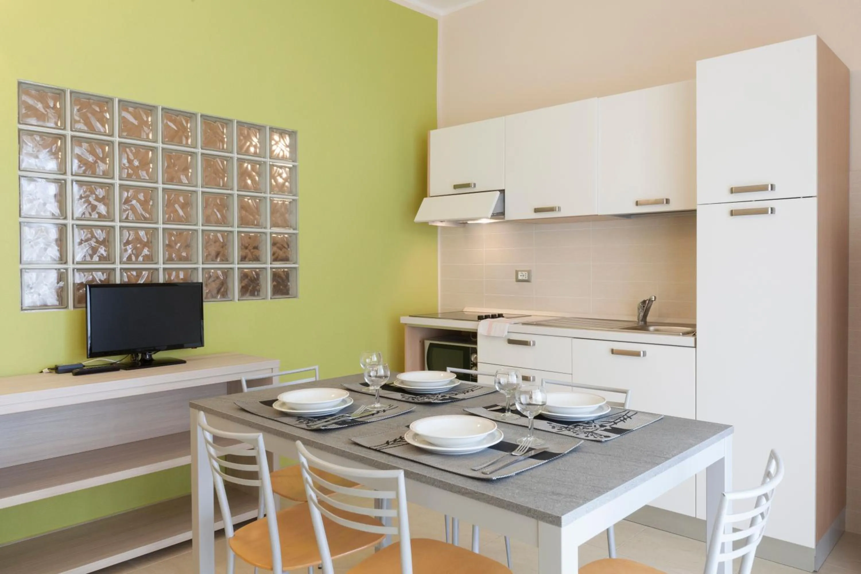 Kitchen or kitchenette in Diano Sporting Apartments