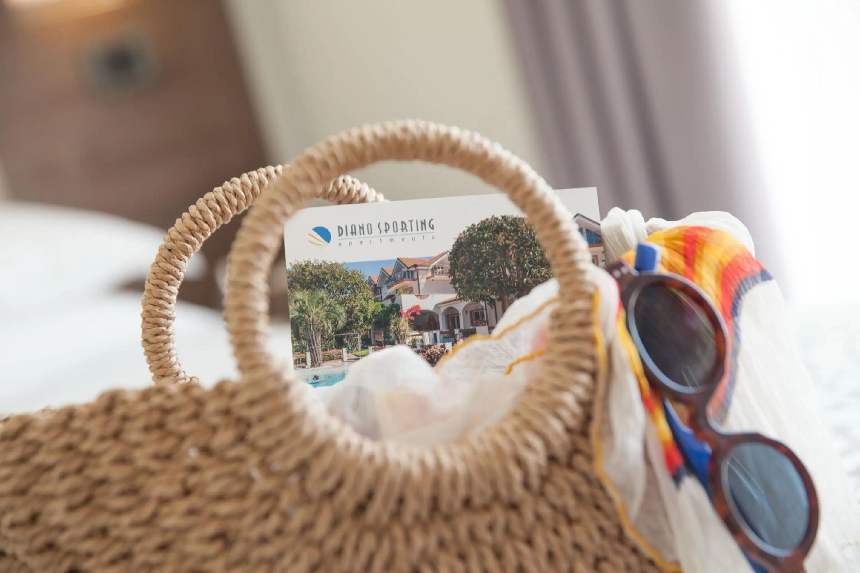 Bed in Diano Sporting Apartments