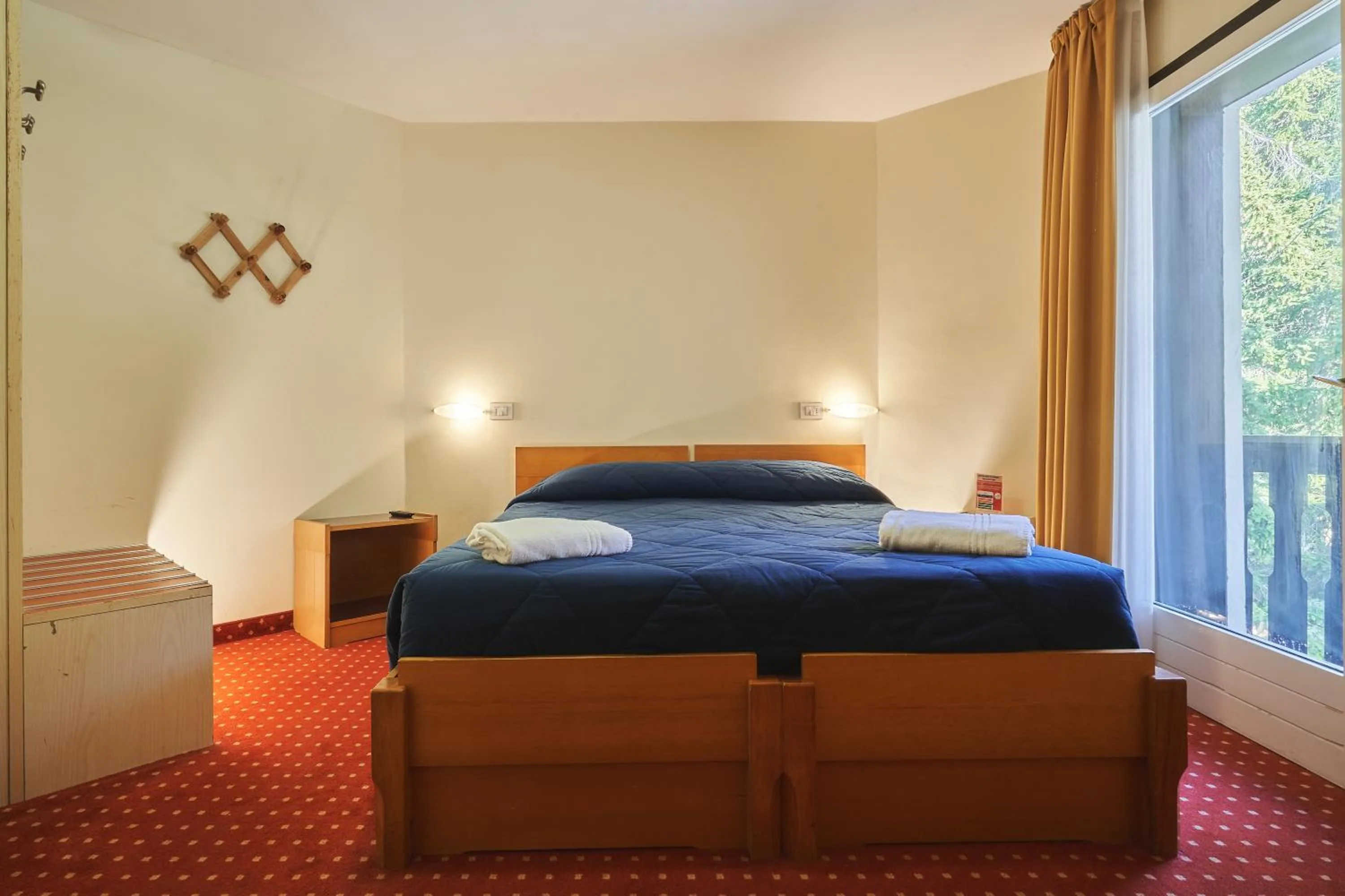 Bedroom, Bed in Hotel Dolomiti - Azzurro Club