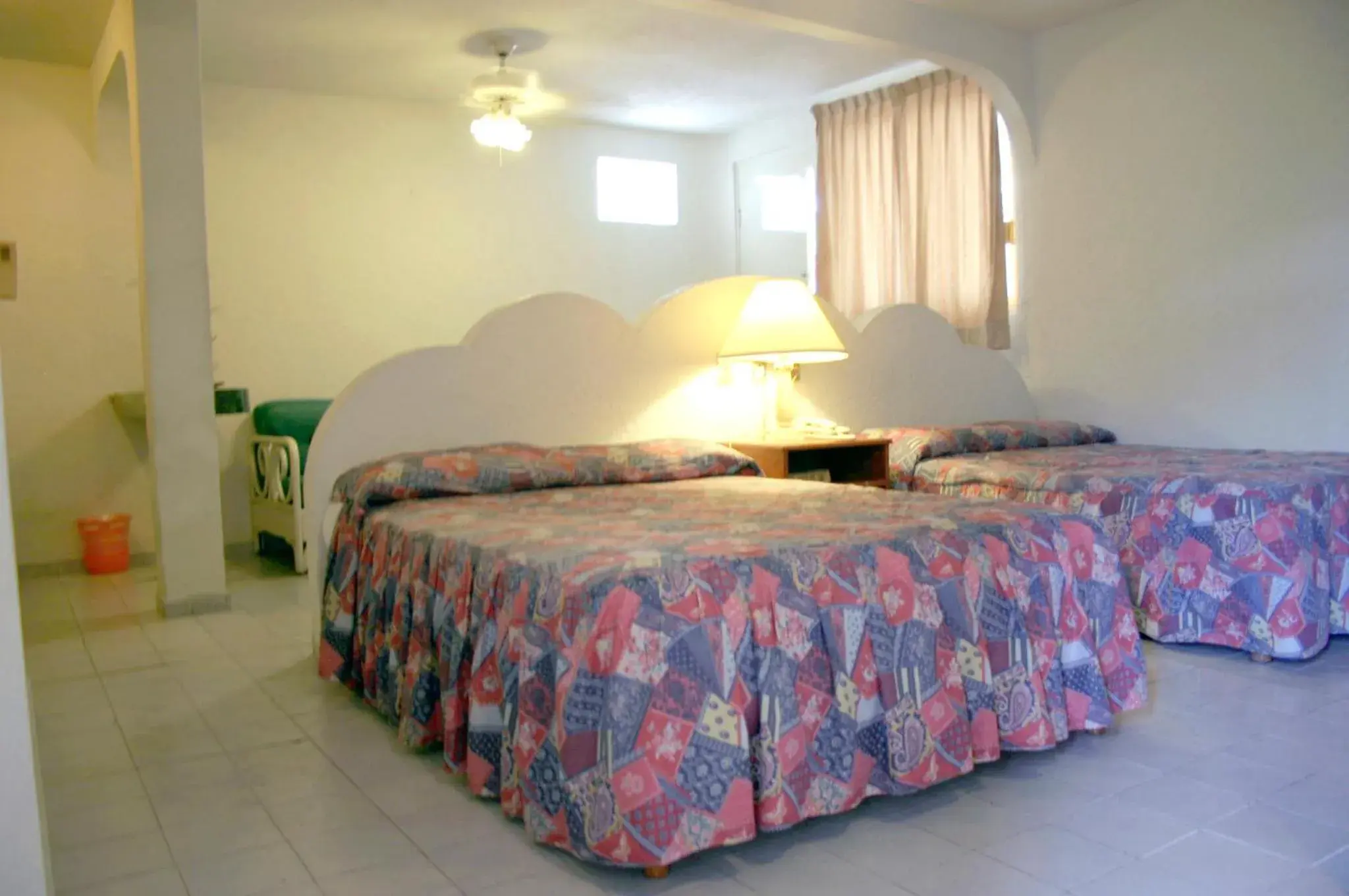 Photo of the whole room, Bed in Hotel Suites Jazmín Acapulco Photo of the whole room, Bed in Hotel Suites Jazmín Acapulco