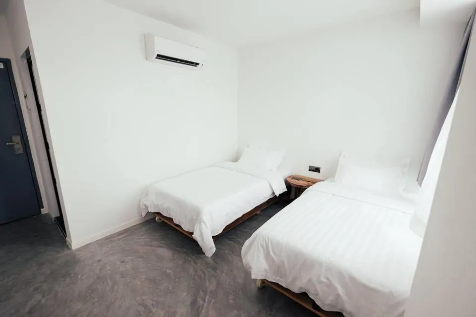 Bed in White Loft Hotel