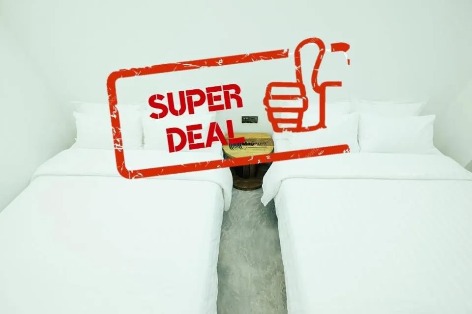 Bed in White Loft Hotel