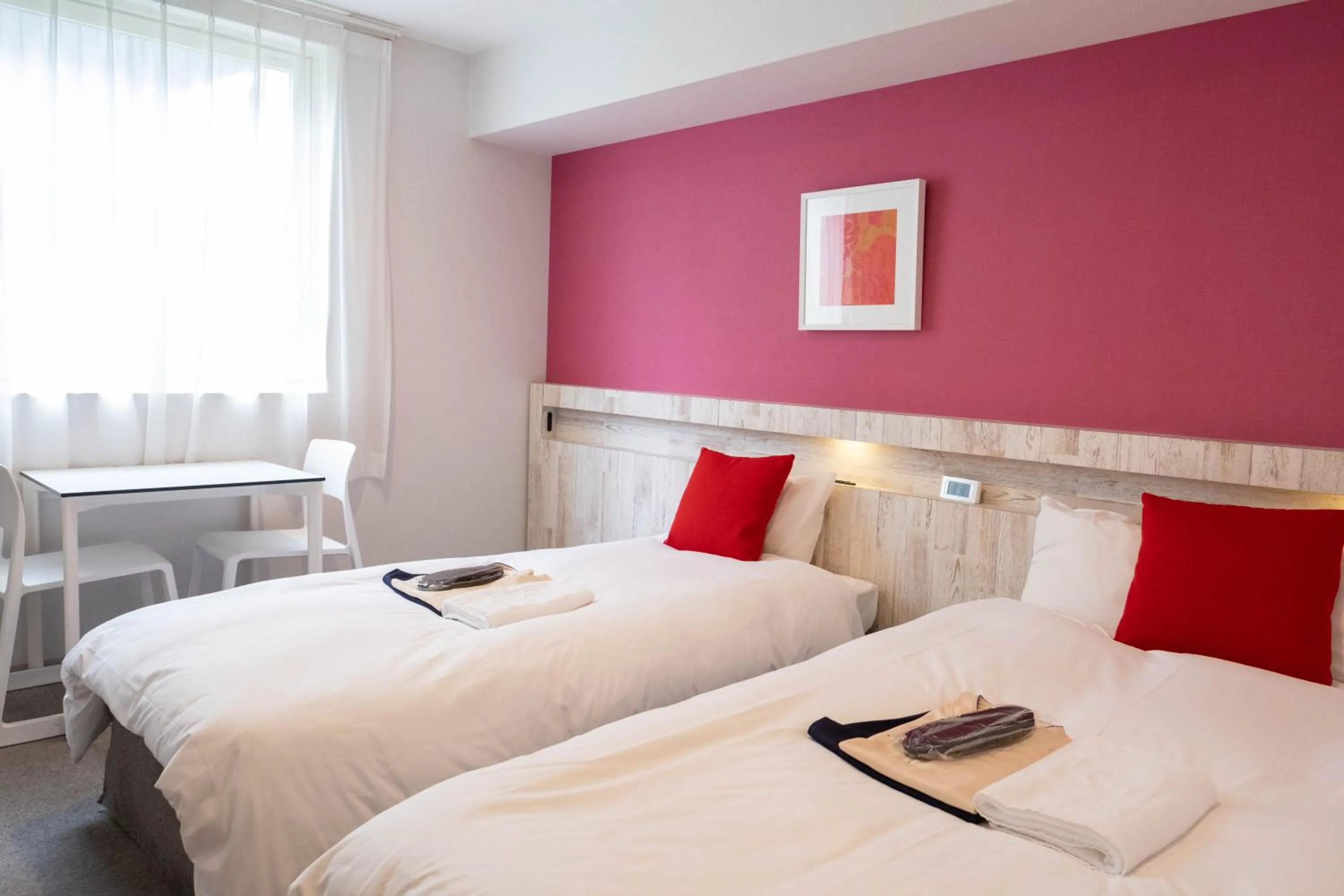 Bed in La'gent Hotel Osaka Bay