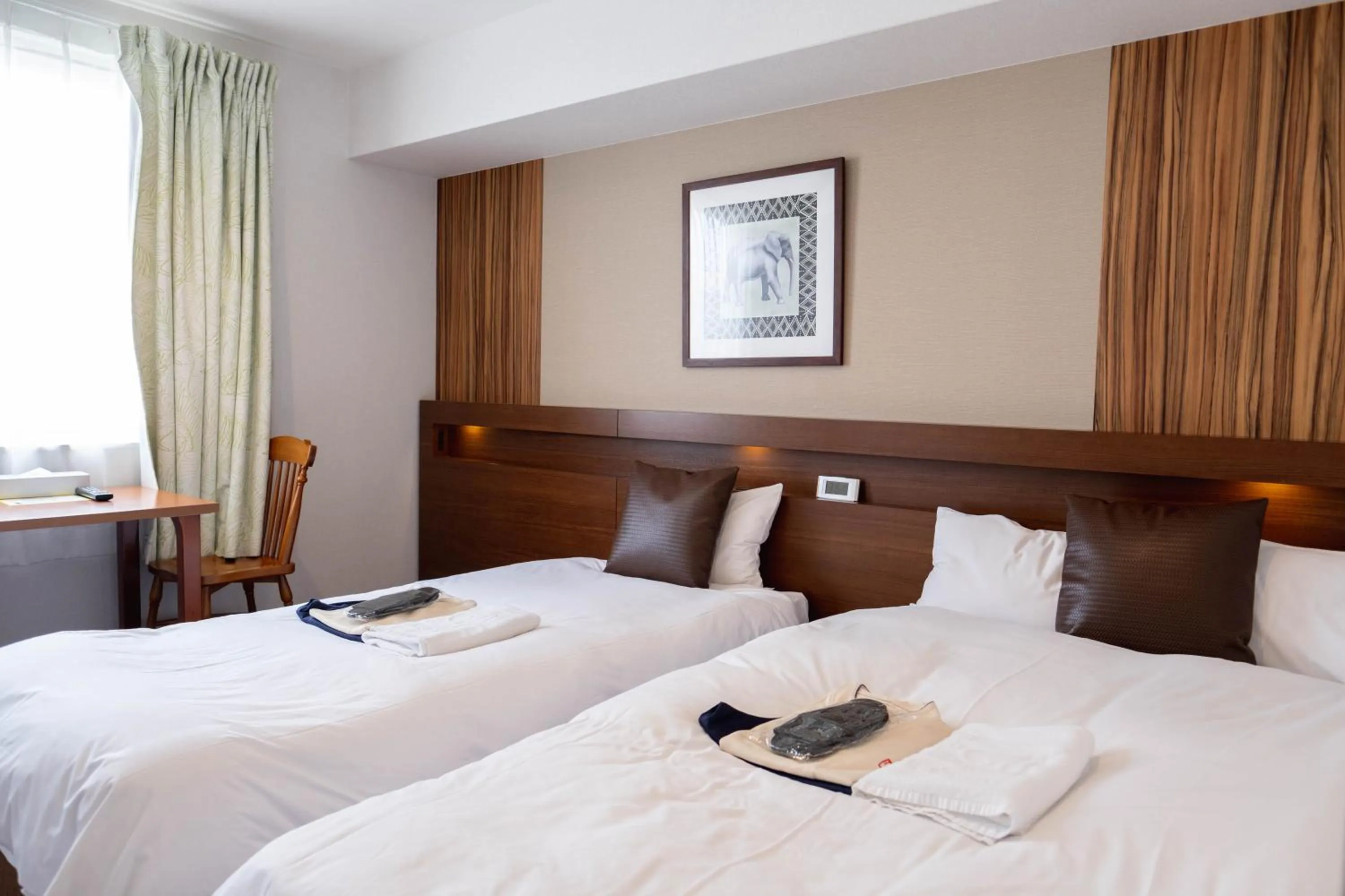 Bed in La'gent Hotel Osaka Bay